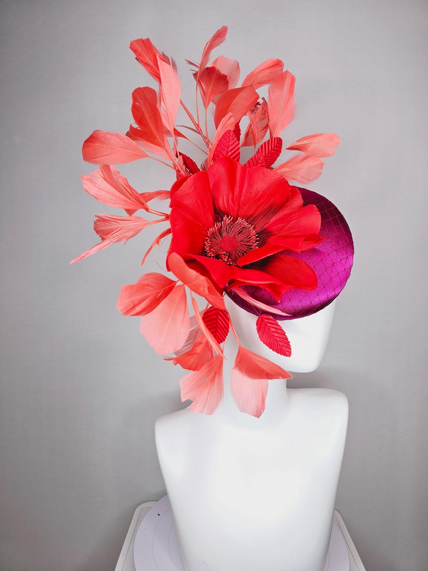 kentucky derby fascinator fuchsia pink satin with netting with large cherry red silk flower beaded core red velvet leaves coral feathers
