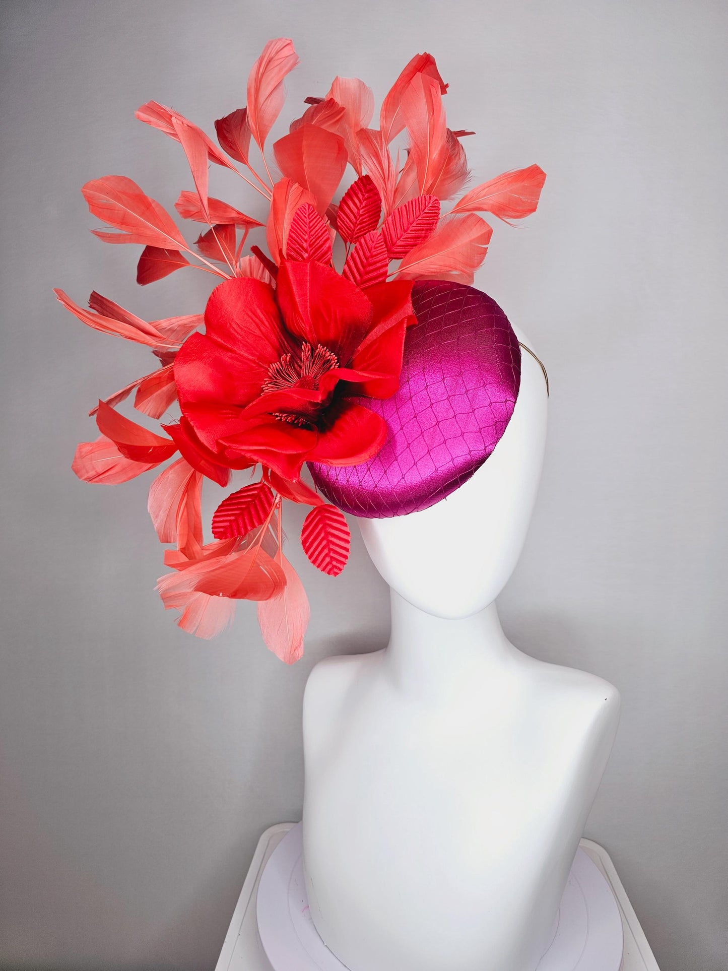 kentucky derby fascinator fuchsia pink satin with netting with large cherry red silk flower beaded core red velvet leaves coral feathers