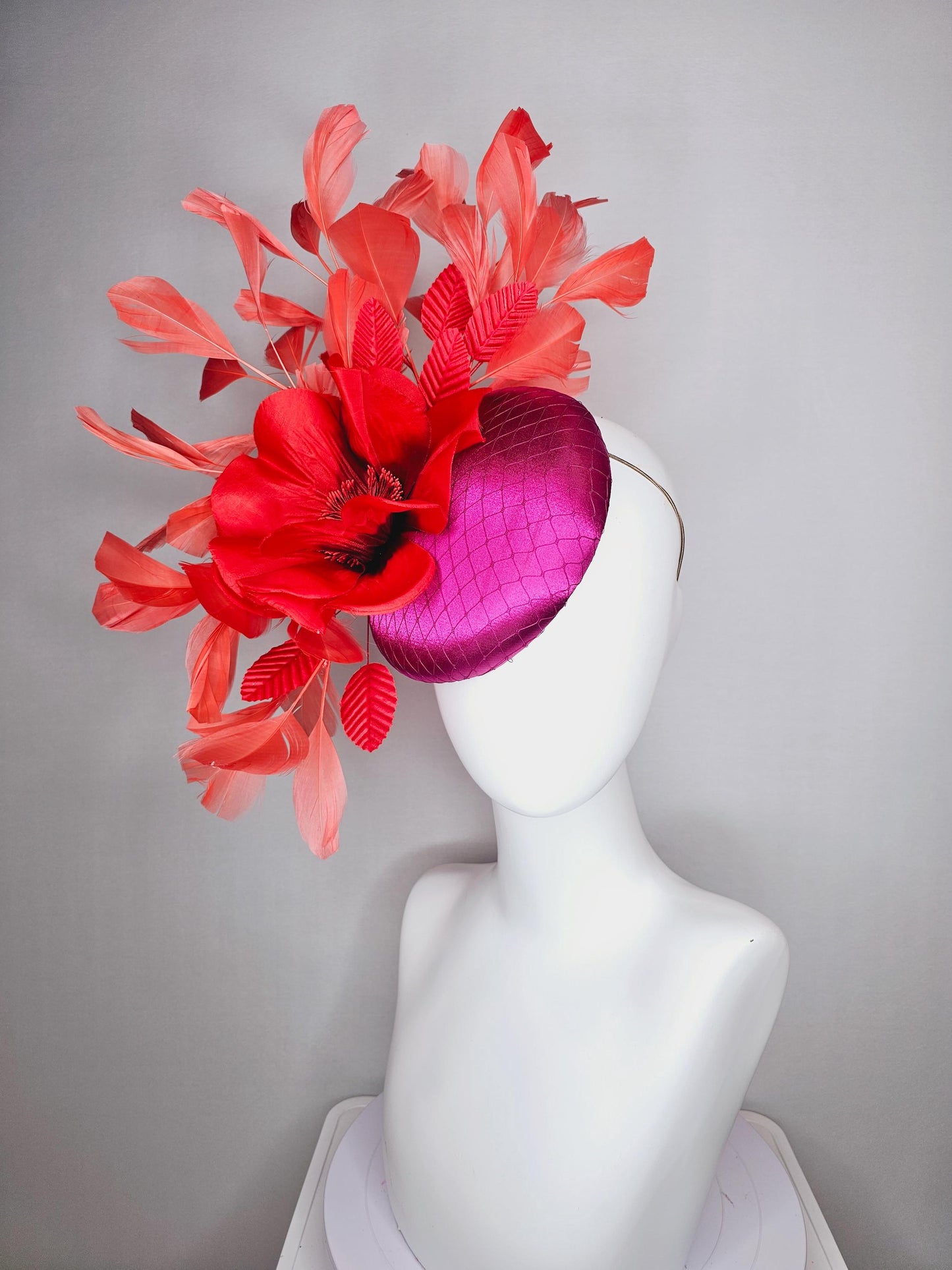 kentucky derby fascinator fuchsia pink satin with netting with large cherry red silk flower beaded core red velvet leaves coral feathers