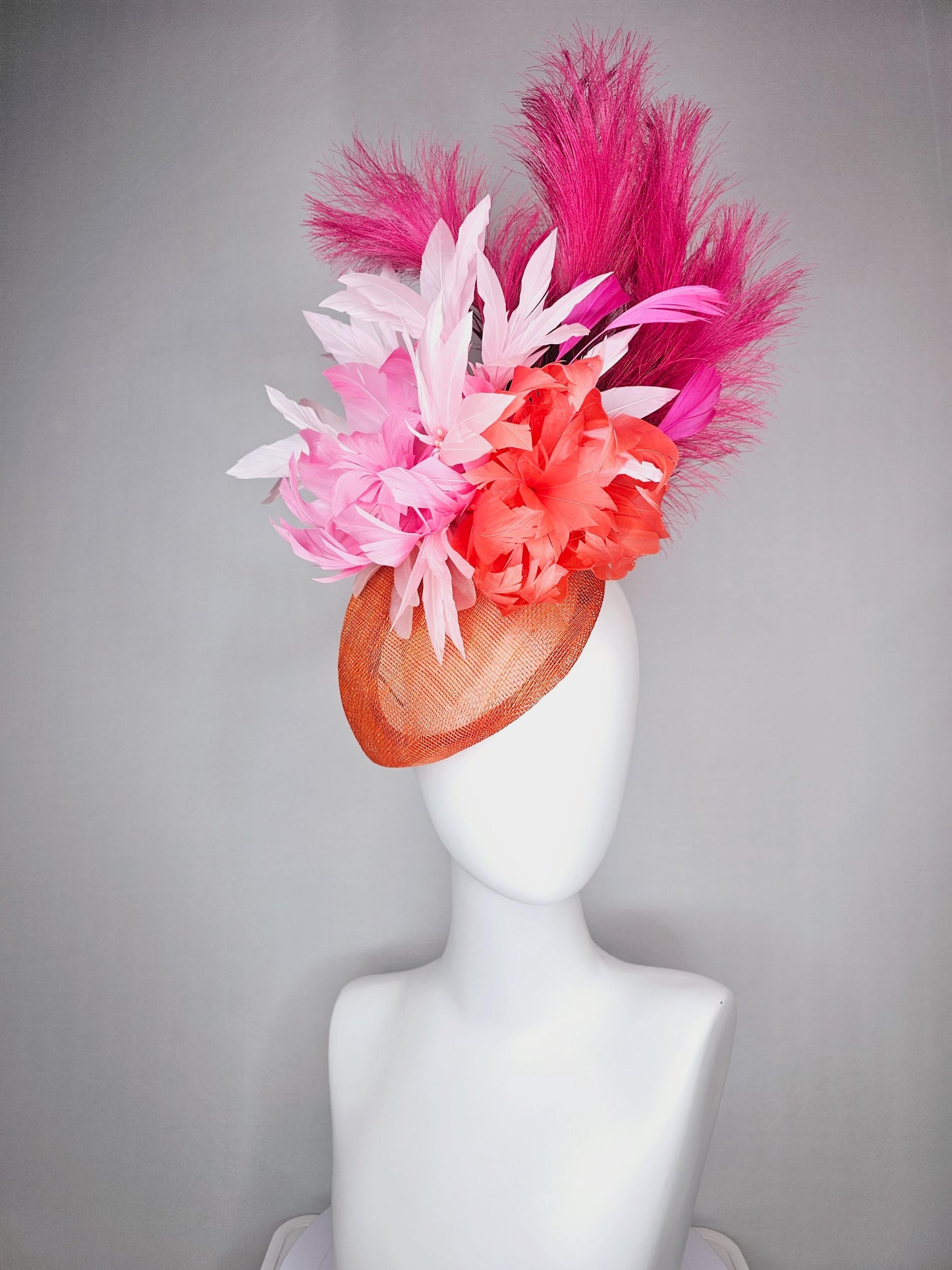 kentucky derby hat fascinator pointed burnt orange sinamay with light pink red orange feather flowers pink feathers hot pink pampas grass