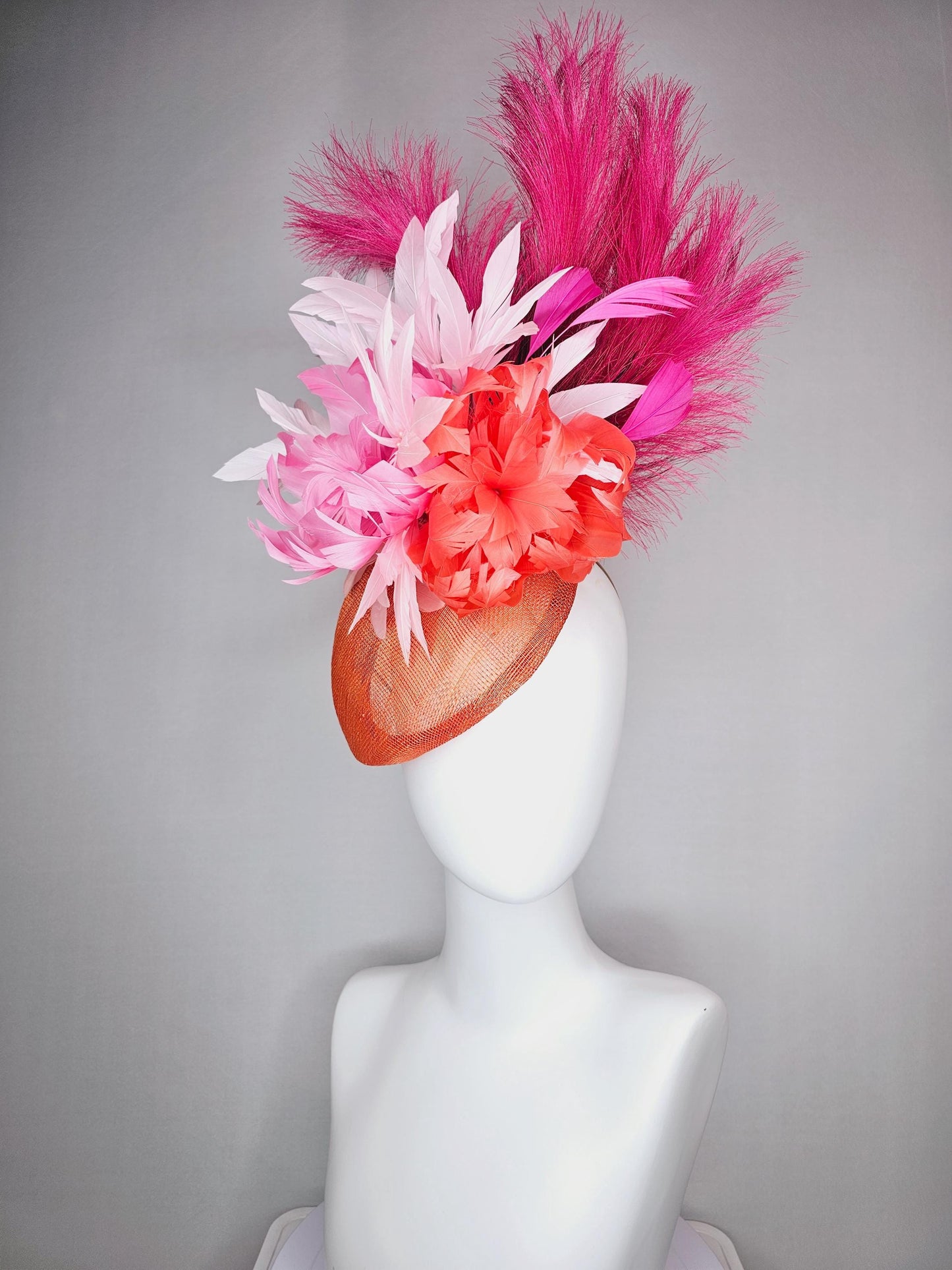 kentucky derby hat fascinator pointed burnt orange sinamay with light pink red orange feather flowers pink feathers hot pink pampas grass