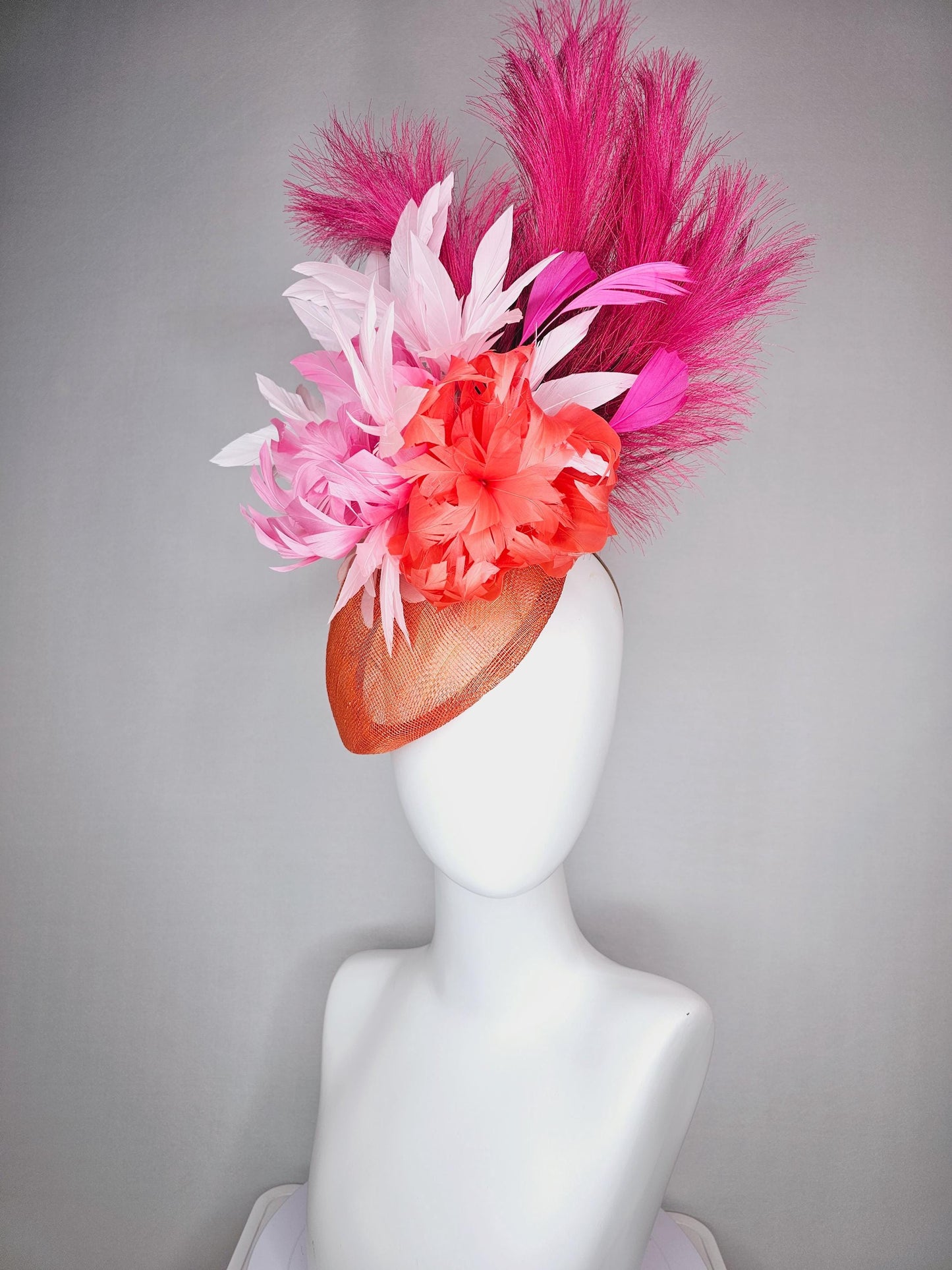 kentucky derby hat fascinator pointed burnt orange sinamay with light pink red orange feather flowers pink feathers hot pink pampas grass