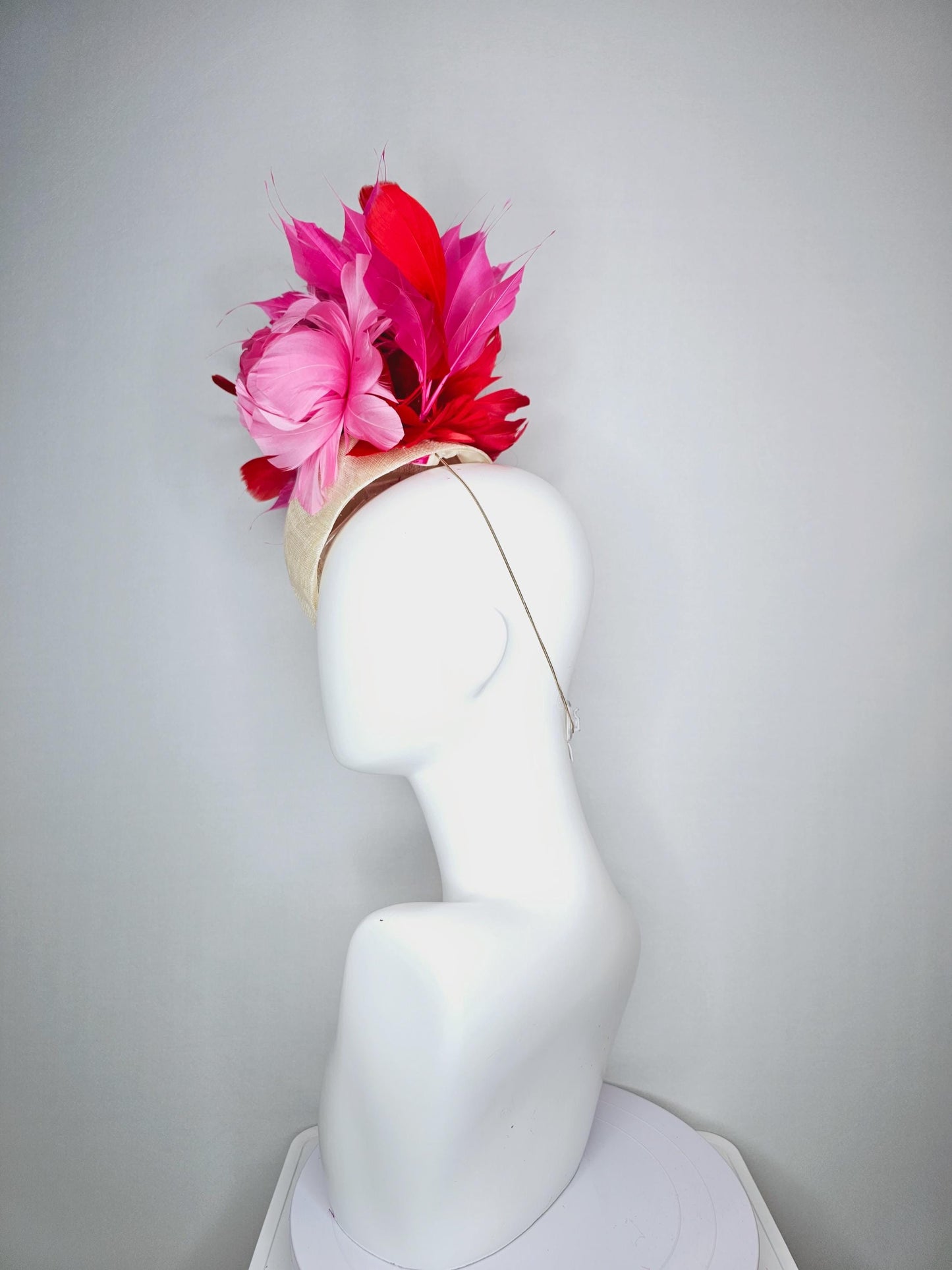kentucky derby hat fascinator neutral beige  pointed teardrop perch sinamay with fluffy blush pink feather flower and pink red feathers