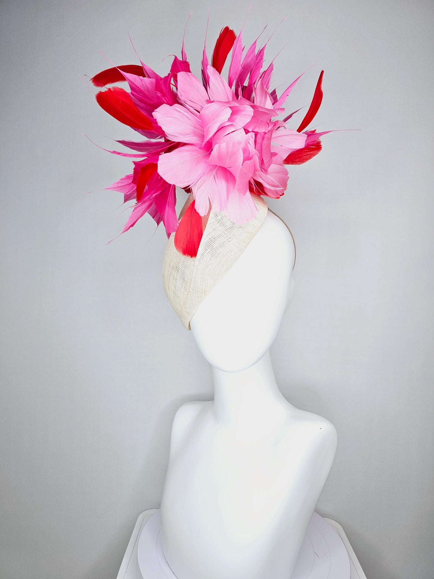kentucky derby hat fascinator neutral beige  pointed teardrop perch sinamay with fluffy blush pink feather flower and pink red feathers