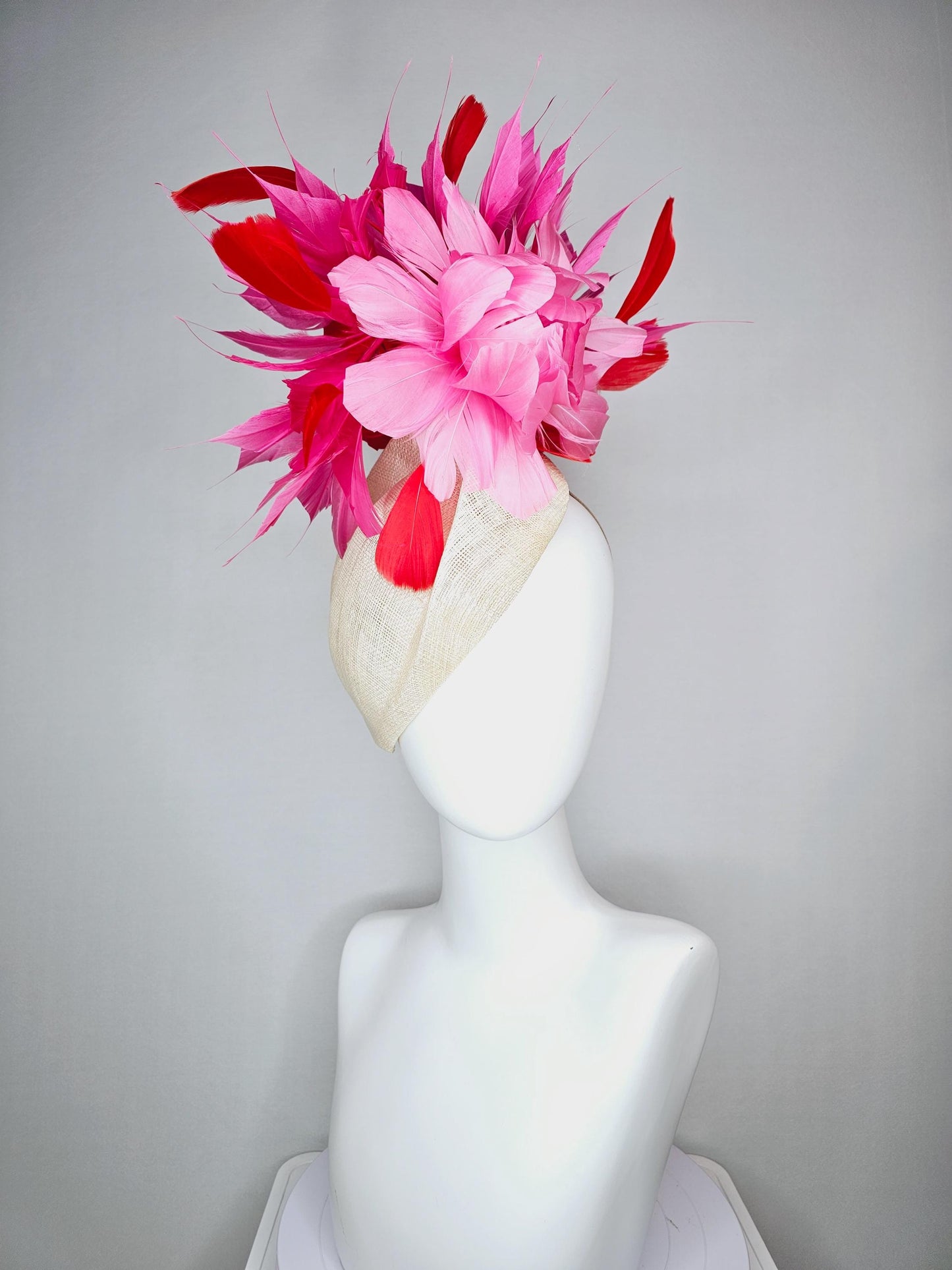kentucky derby hat fascinator neutral beige  pointed teardrop perch sinamay with fluffy blush pink feather flower and pink red feathers