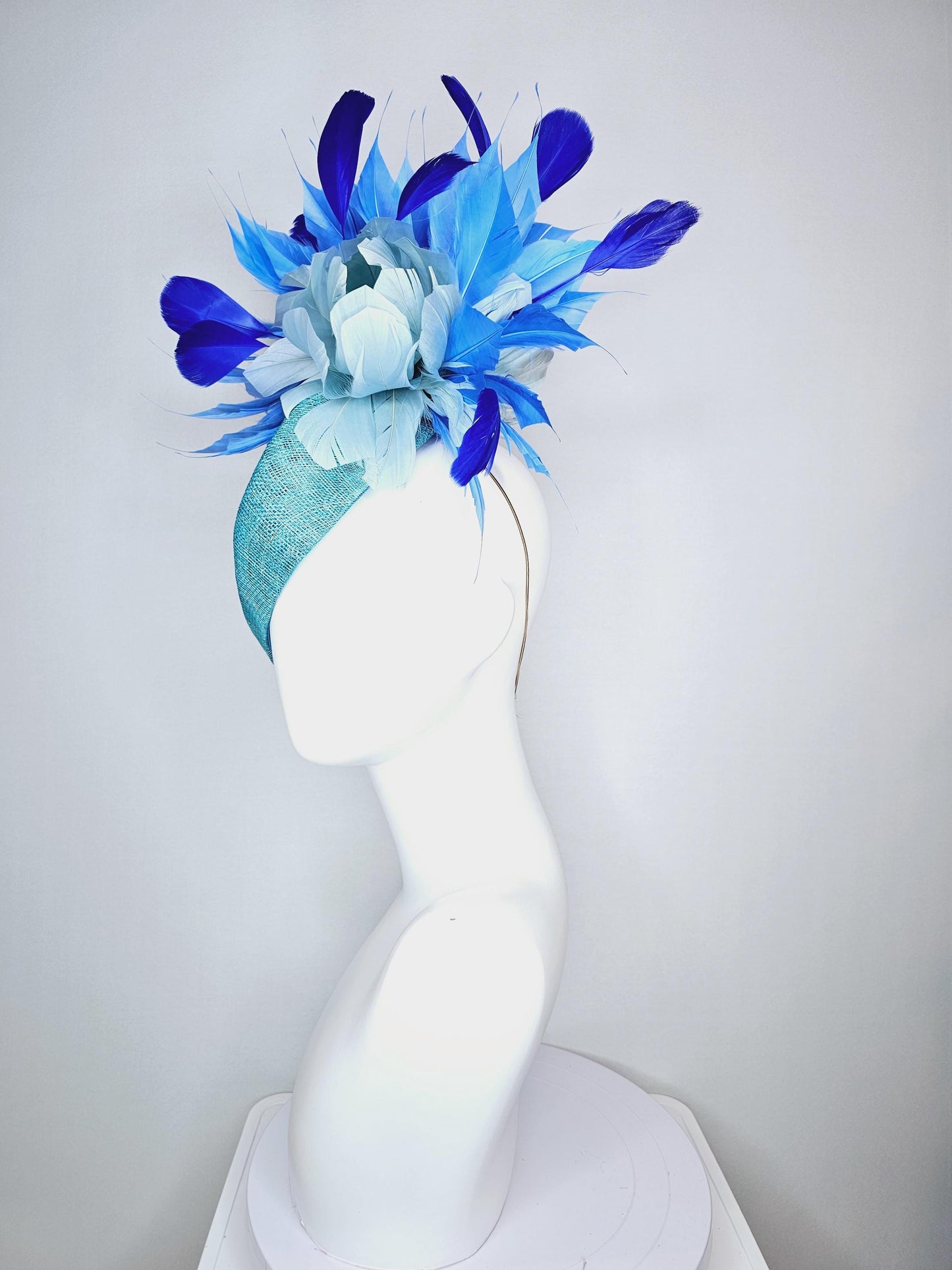 kentucky derby hat fascinator turquoise blue pointed teardrop perch sinamay with fluffy baby blue feather flower royal cobalt blue feathers