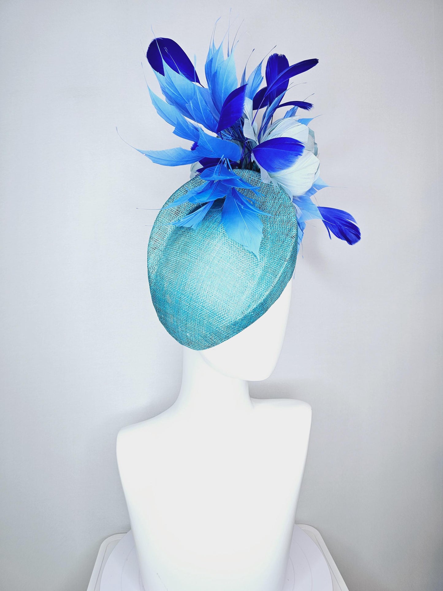 kentucky derby hat fascinator turquoise blue pointed teardrop perch sinamay with fluffy baby blue feather flower royal cobalt blue feathers
