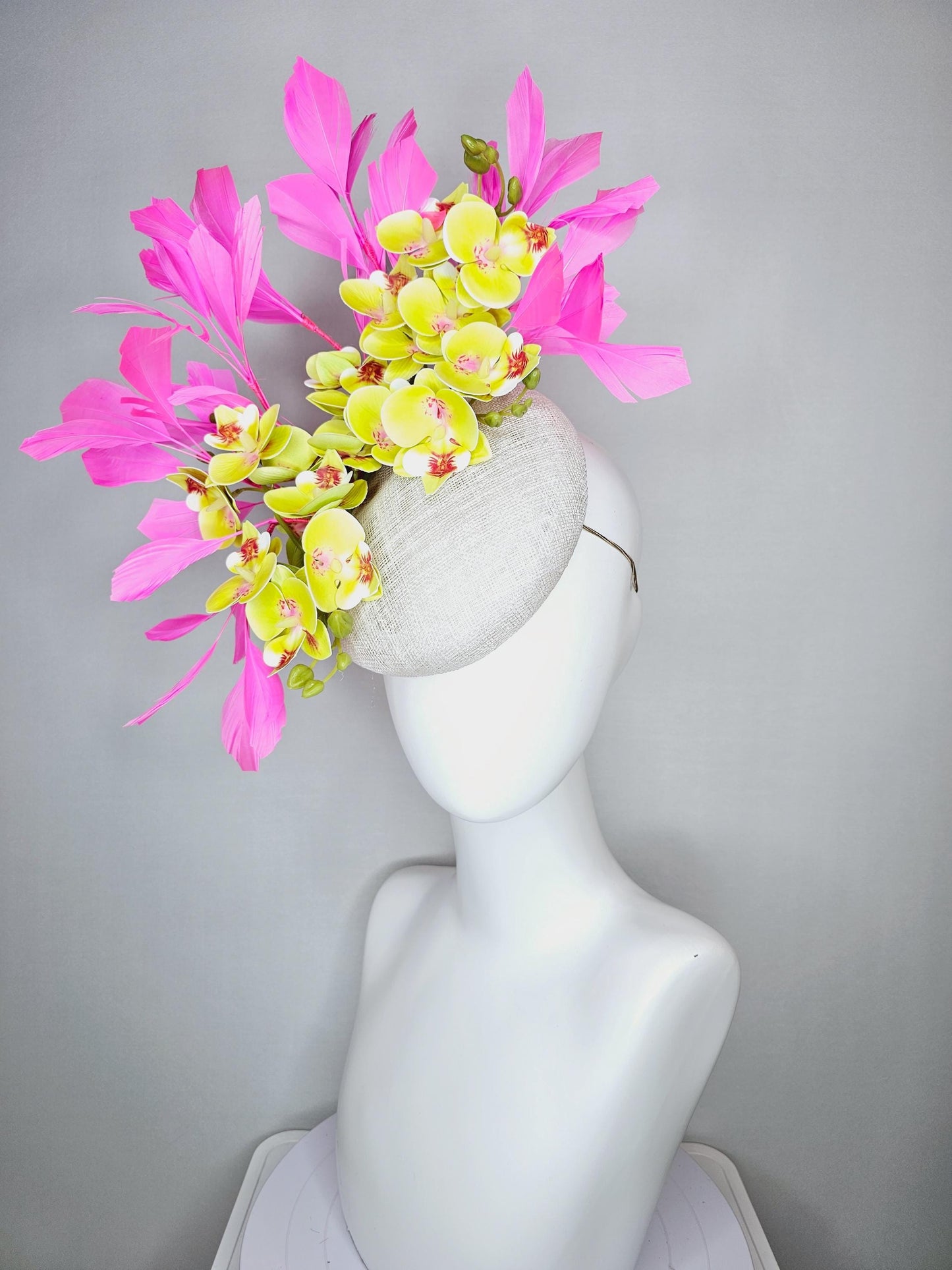 kentucky derby hat fascinator neutral white sinamay with yellow and dark red satin orchid flowers with bubble gum pink branching feathers