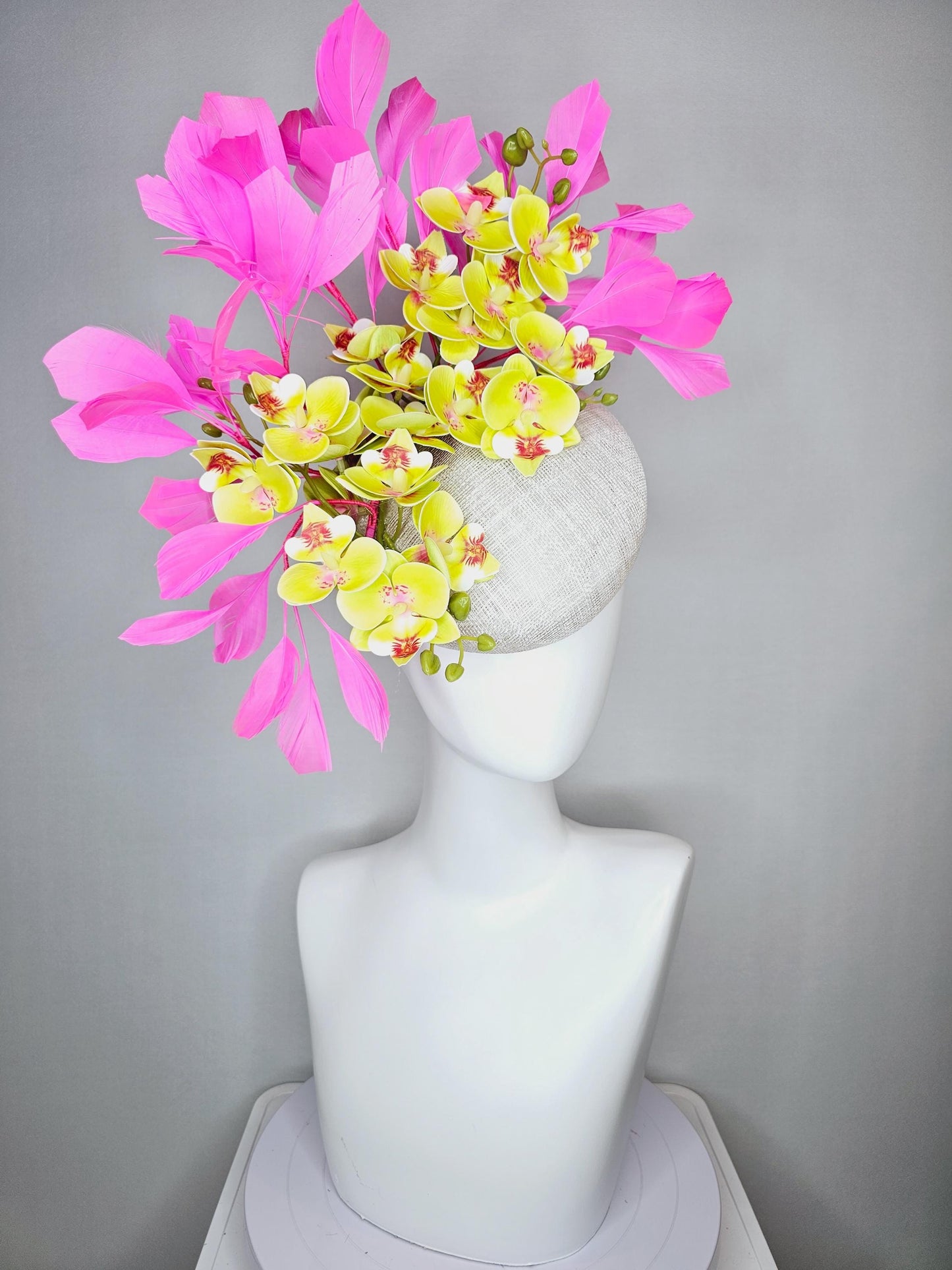 kentucky derby hat fascinator neutral white sinamay with yellow and dark red satin orchid flowers with bubble gum pink branching feathers