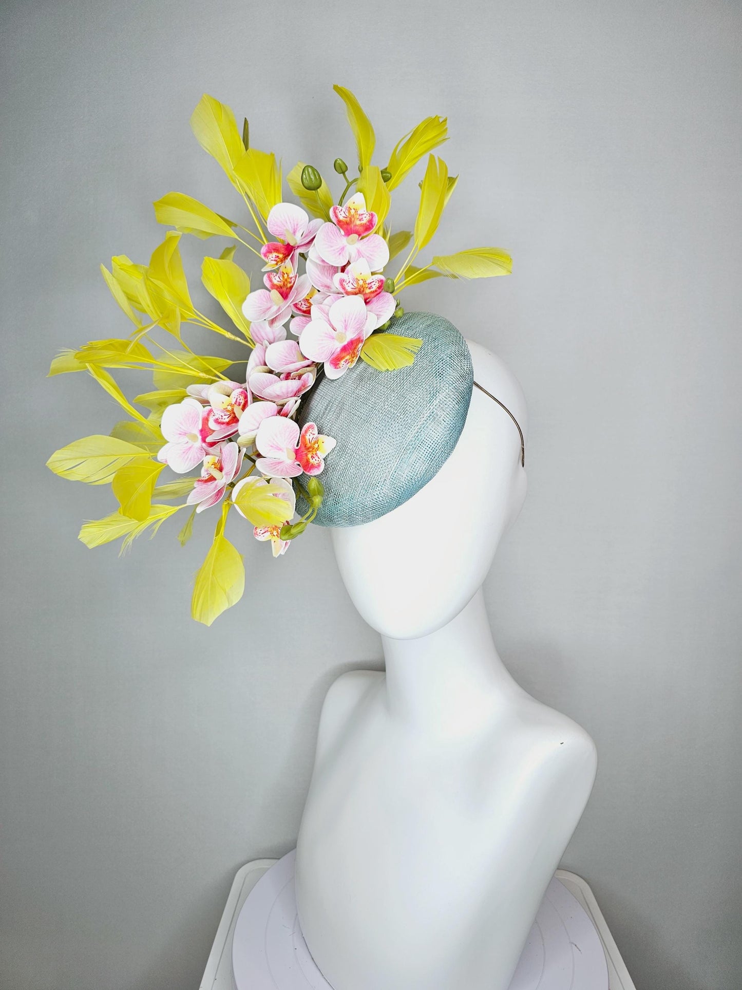 kentucky derby hat fascinator light blue sinamay with white blush pink satin orchid flowers with yellow branching feathers