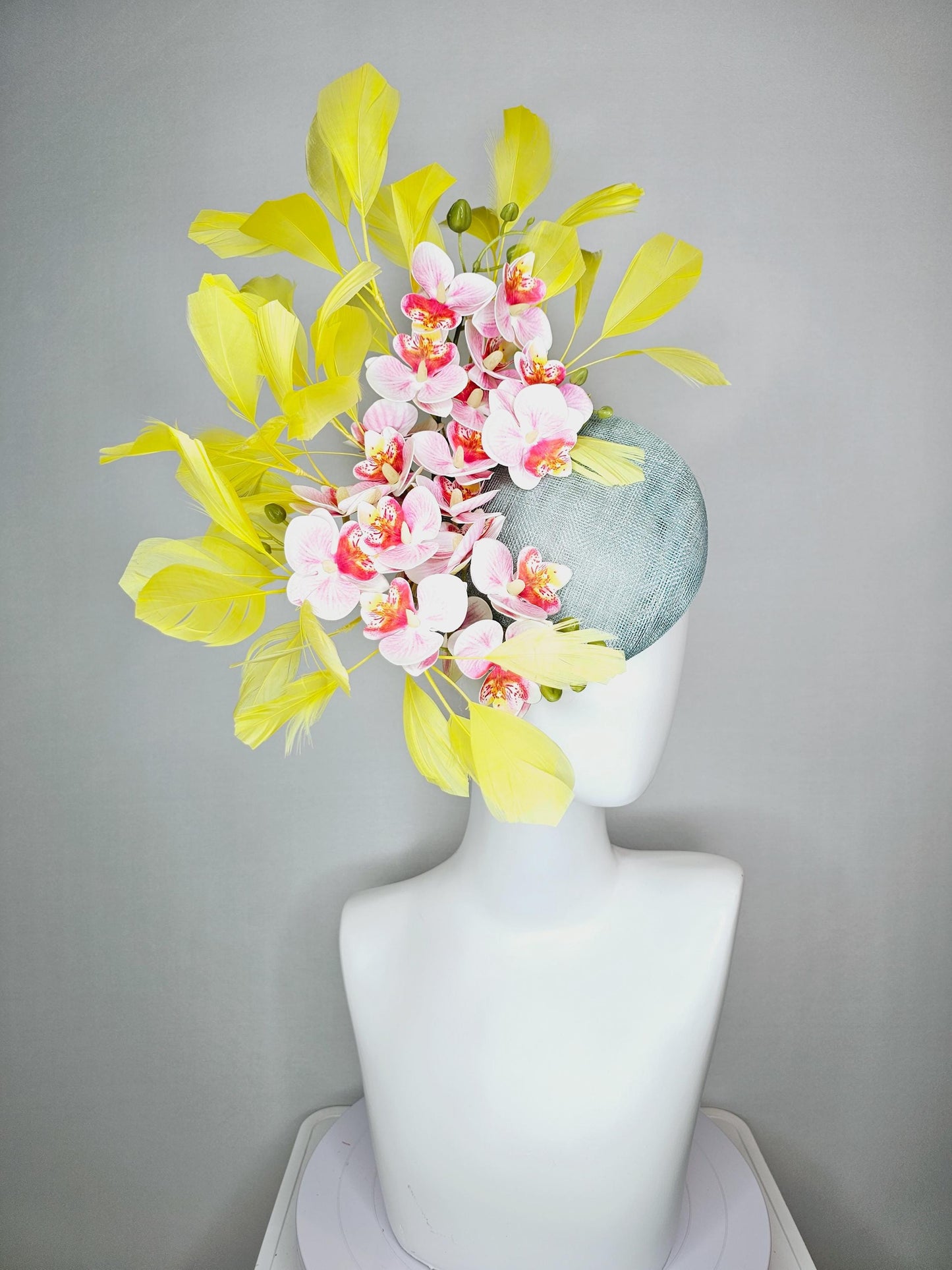 kentucky derby hat fascinator light blue sinamay with white blush pink satin orchid flowers with yellow branching feathers
