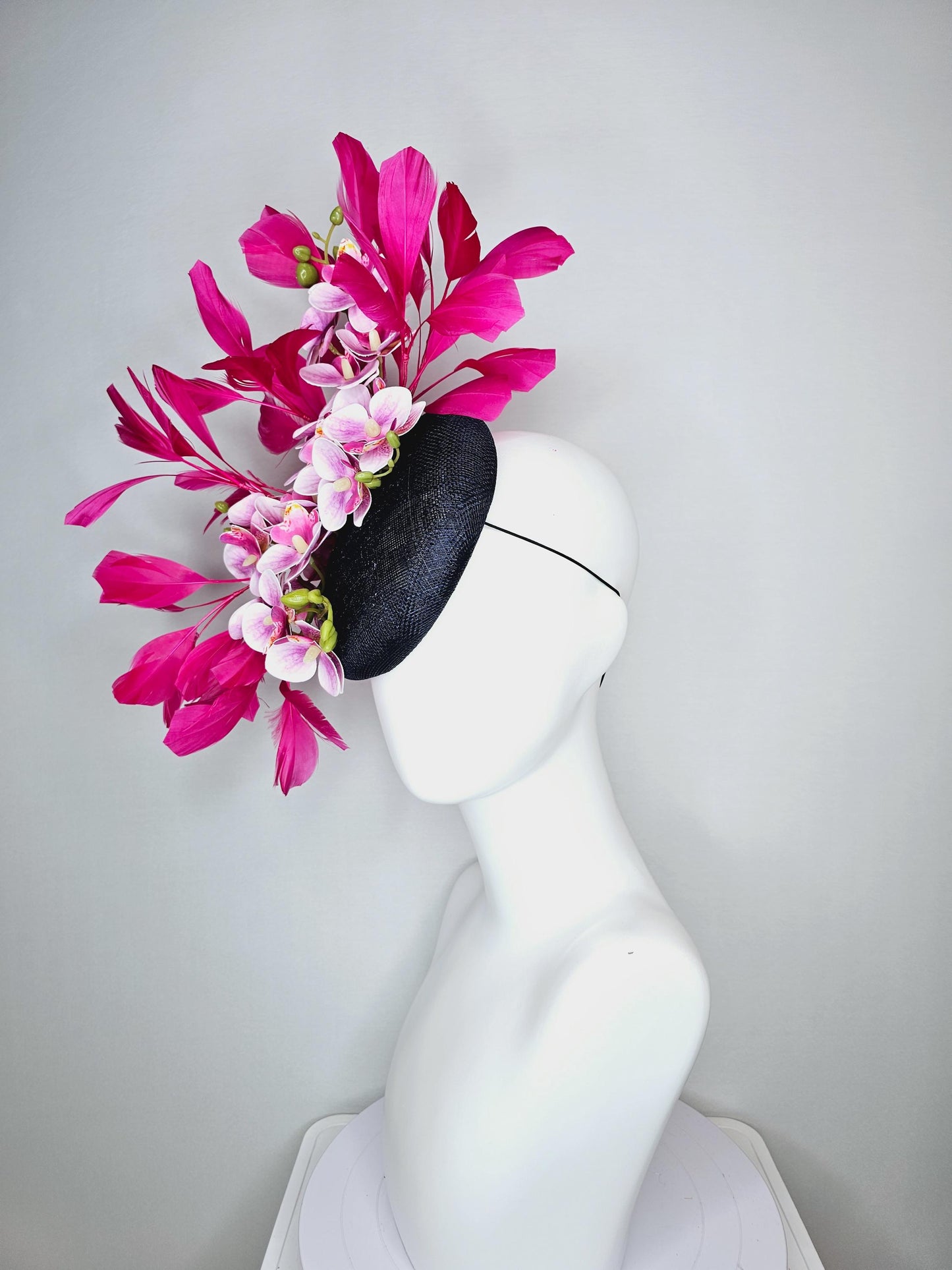 kentucky derby hat fascinator navy blue sinamay with white and blush pink satin orchid flowers and hot pink branching feathers