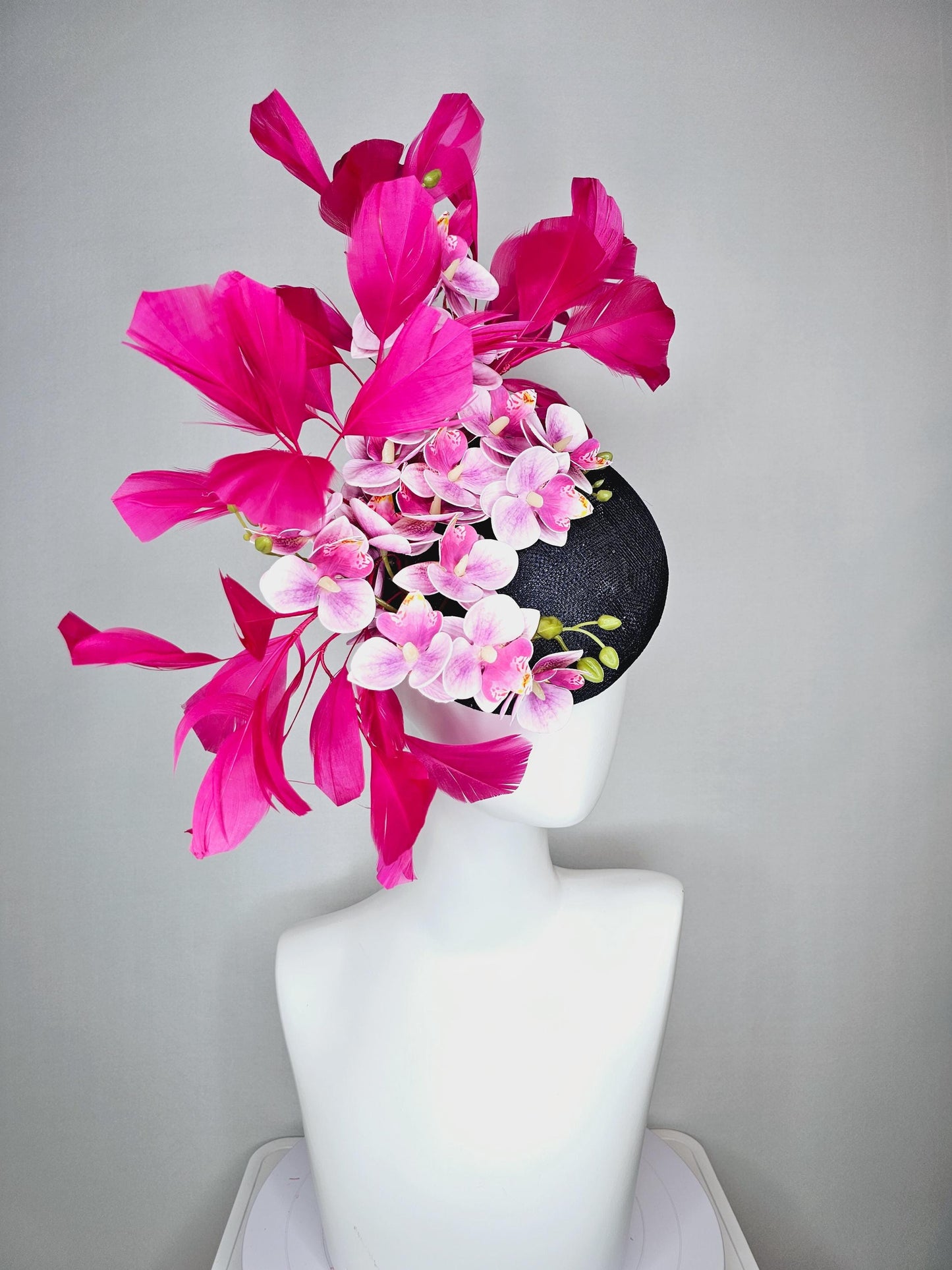 kentucky derby hat fascinator navy blue sinamay with white and blush pink satin orchid flowers and hot pink branching feathers