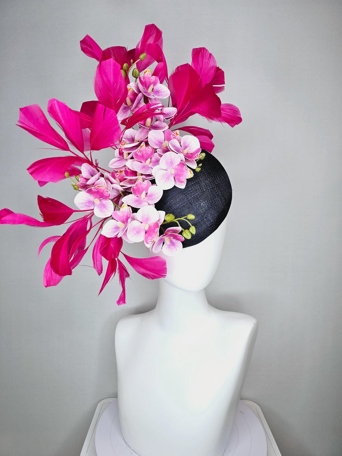 kentucky derby hat fascinator navy blue sinamay with white and blush pink satin orchid flowers and hot pink branching feathers