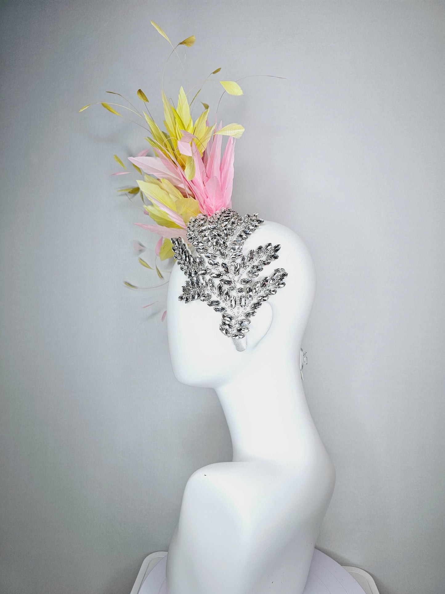 kentucky derby hat fascinator white headband with large clear crystal rhinestone beaded stems and light pink yellow branching feathers