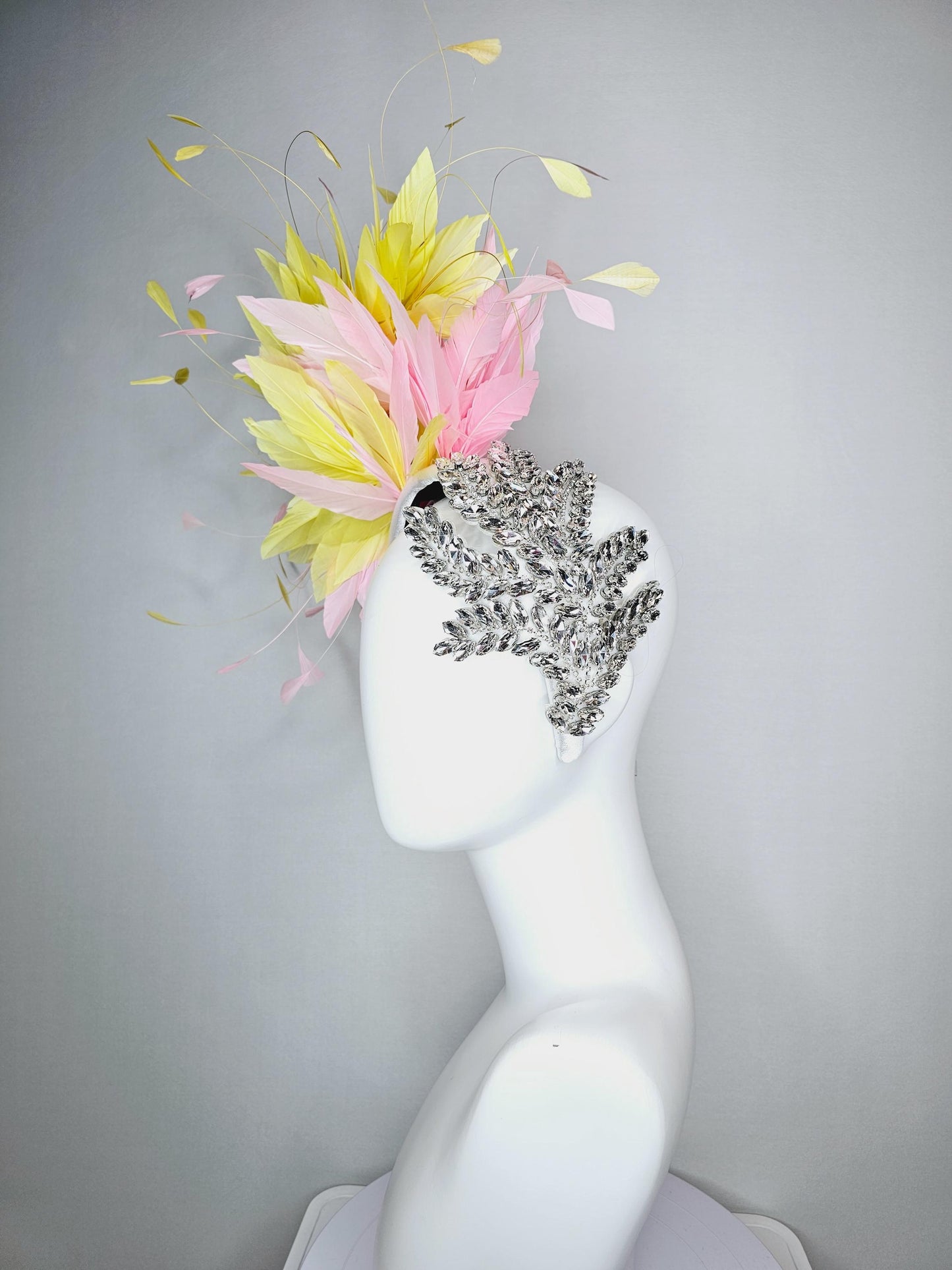 kentucky derby hat fascinator white headband with large clear crystal rhinestone beaded stems and light pink yellow branching feathers