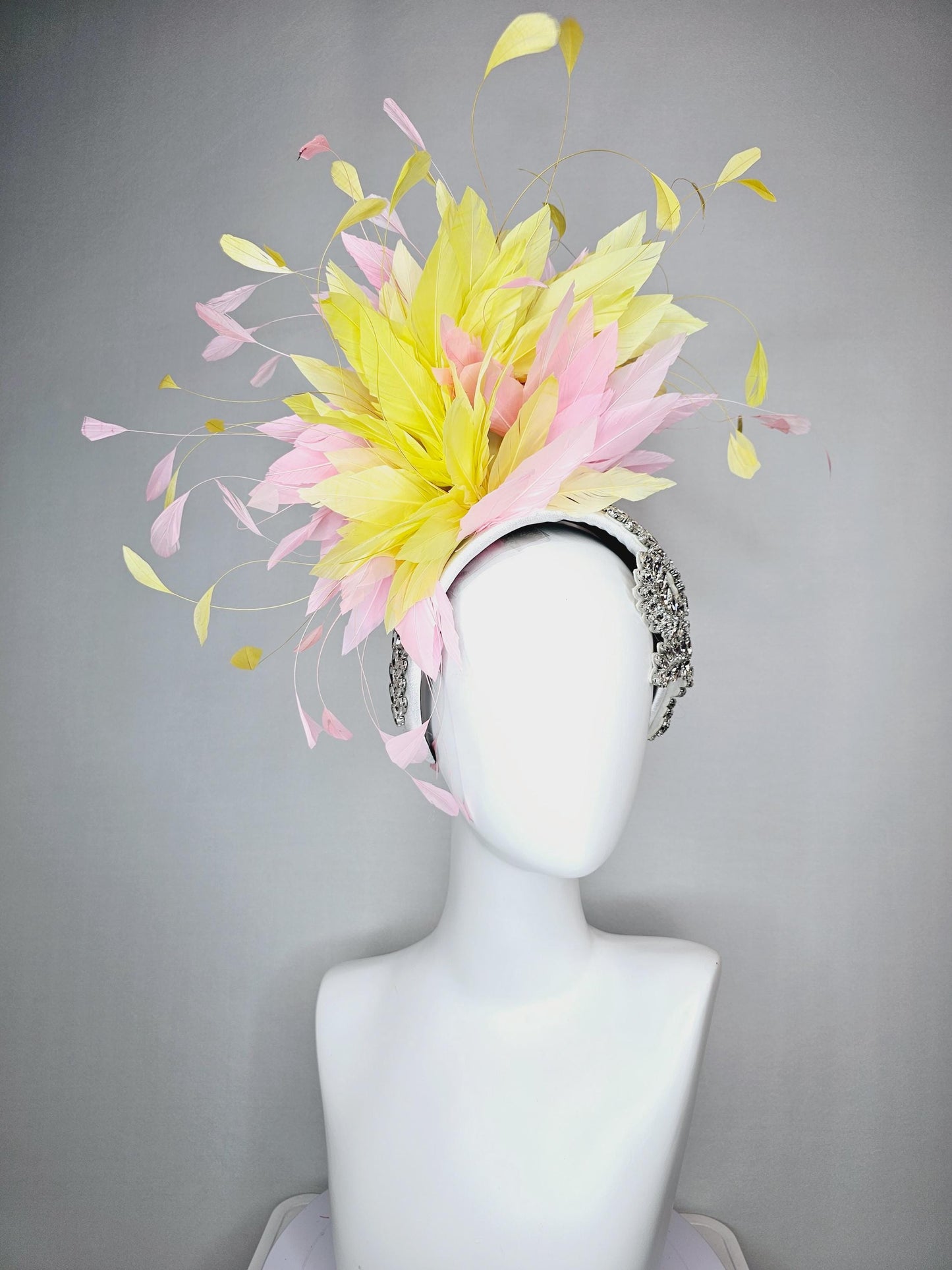 kentucky derby hat fascinator white headband with large clear crystal rhinestone beaded stems and light pink yellow branching feathers