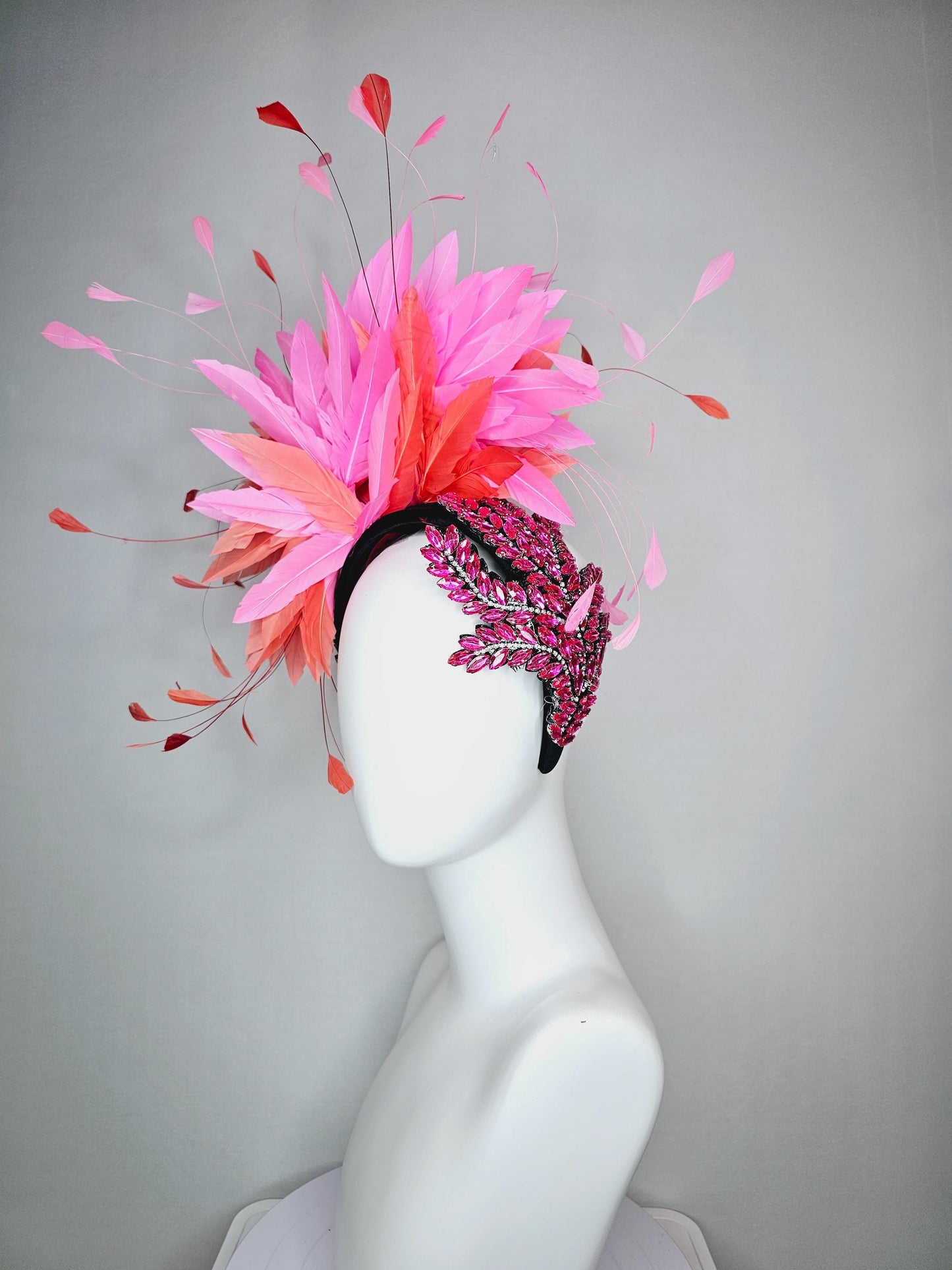 kentucky derby hat fascinator black headband with large pink crystal rhinestone beaded stems and blush pink coral orange branching feathers