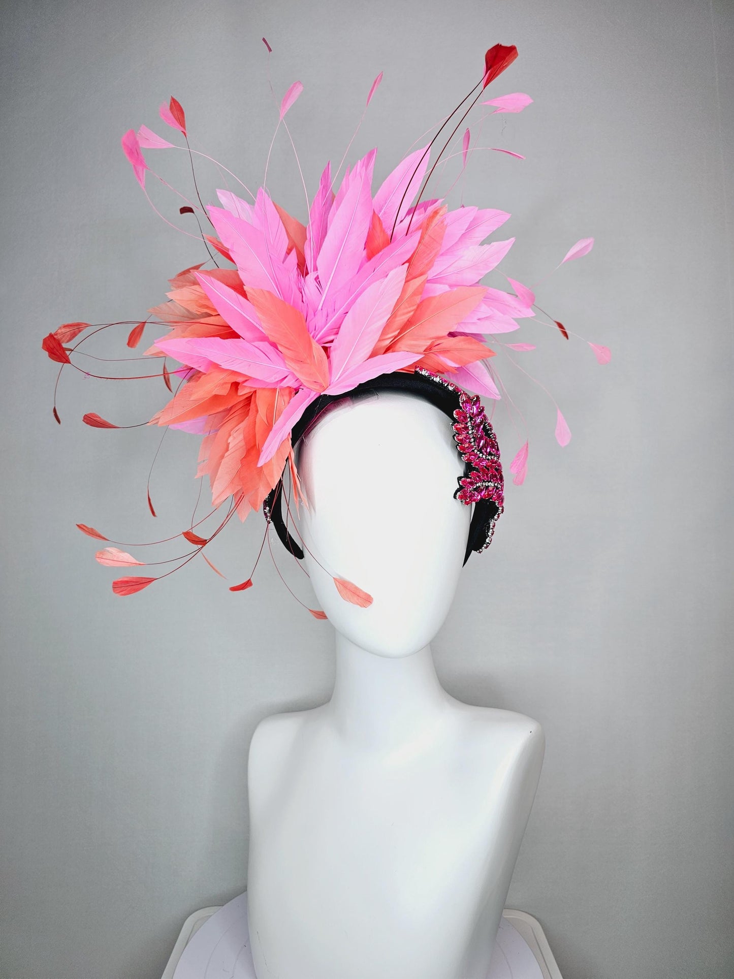 kentucky derby hat fascinator black headband with large pink crystal rhinestone beaded stems and blush pink coral orange branching feathers