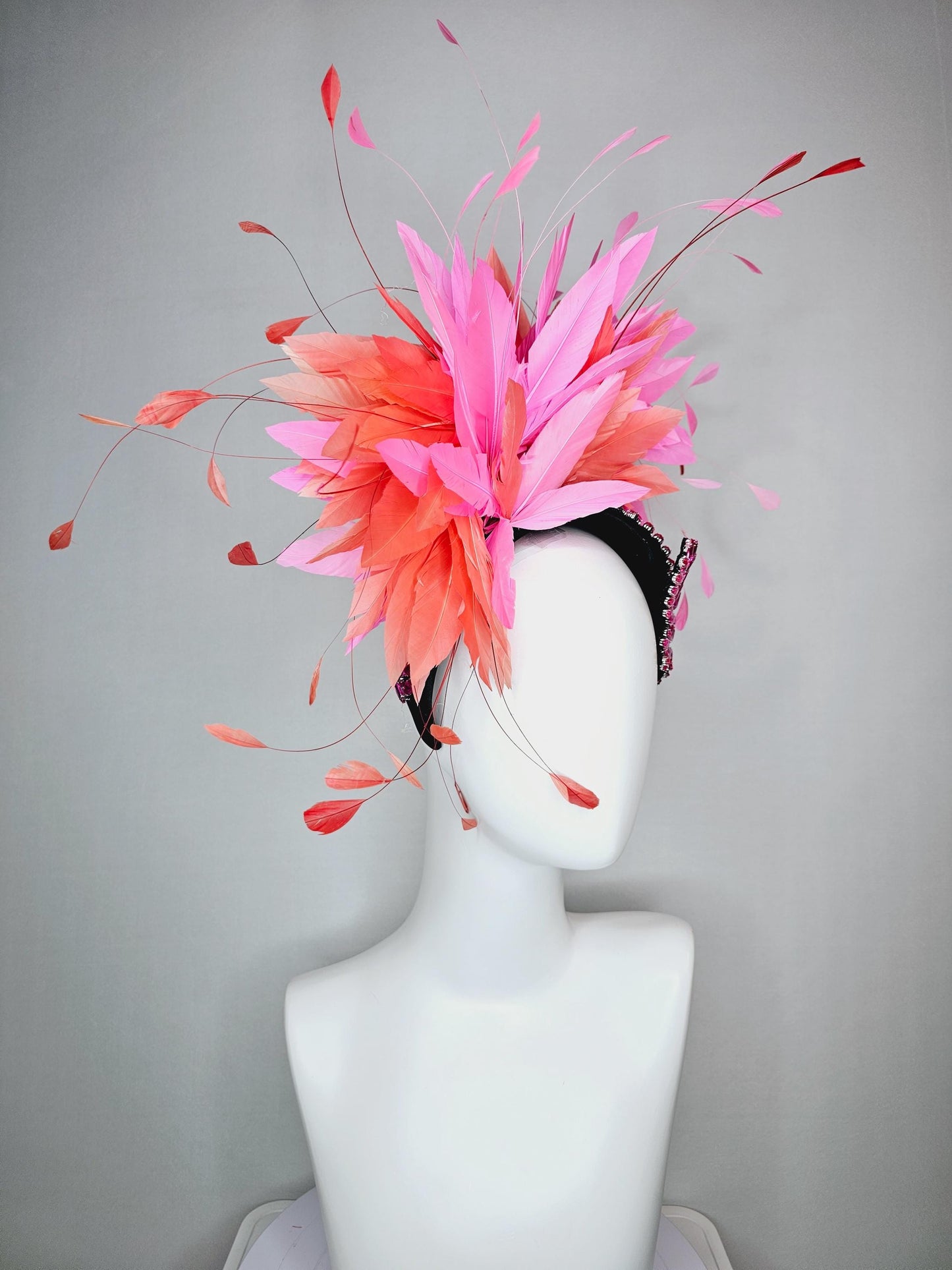 kentucky derby hat fascinator black headband with large pink crystal rhinestone beaded stems and blush pink coral orange branching feathers