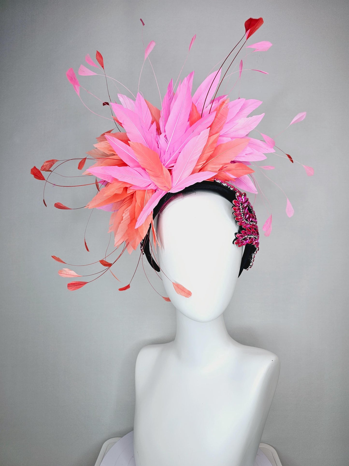 kentucky derby hat fascinator black headband with large pink crystal rhinestone beaded stems and blush pink coral orange branching feathers