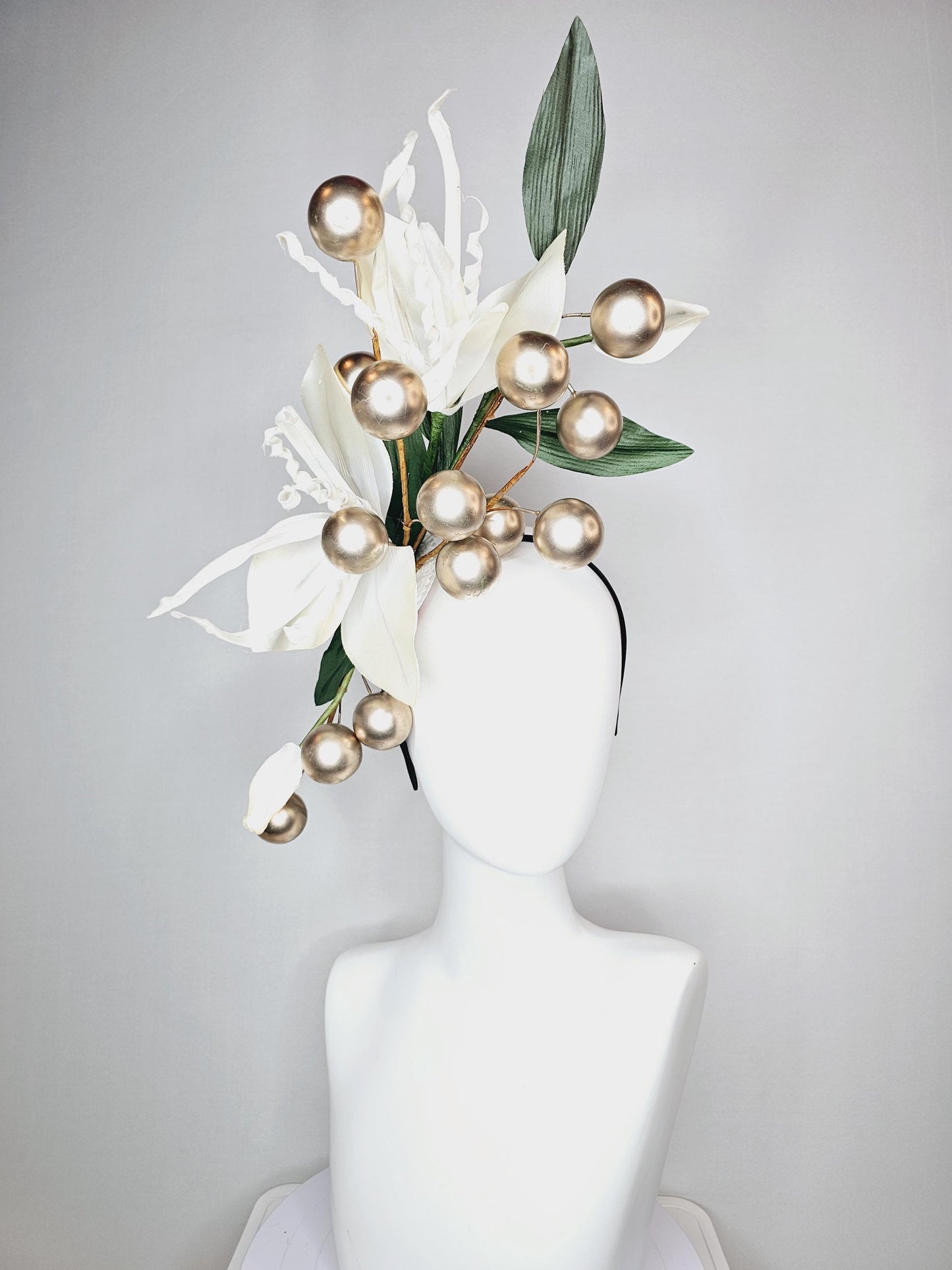 kentucky derby hat fascinator large ivory white satin silk flowers with large dark green leaves and gold pearls