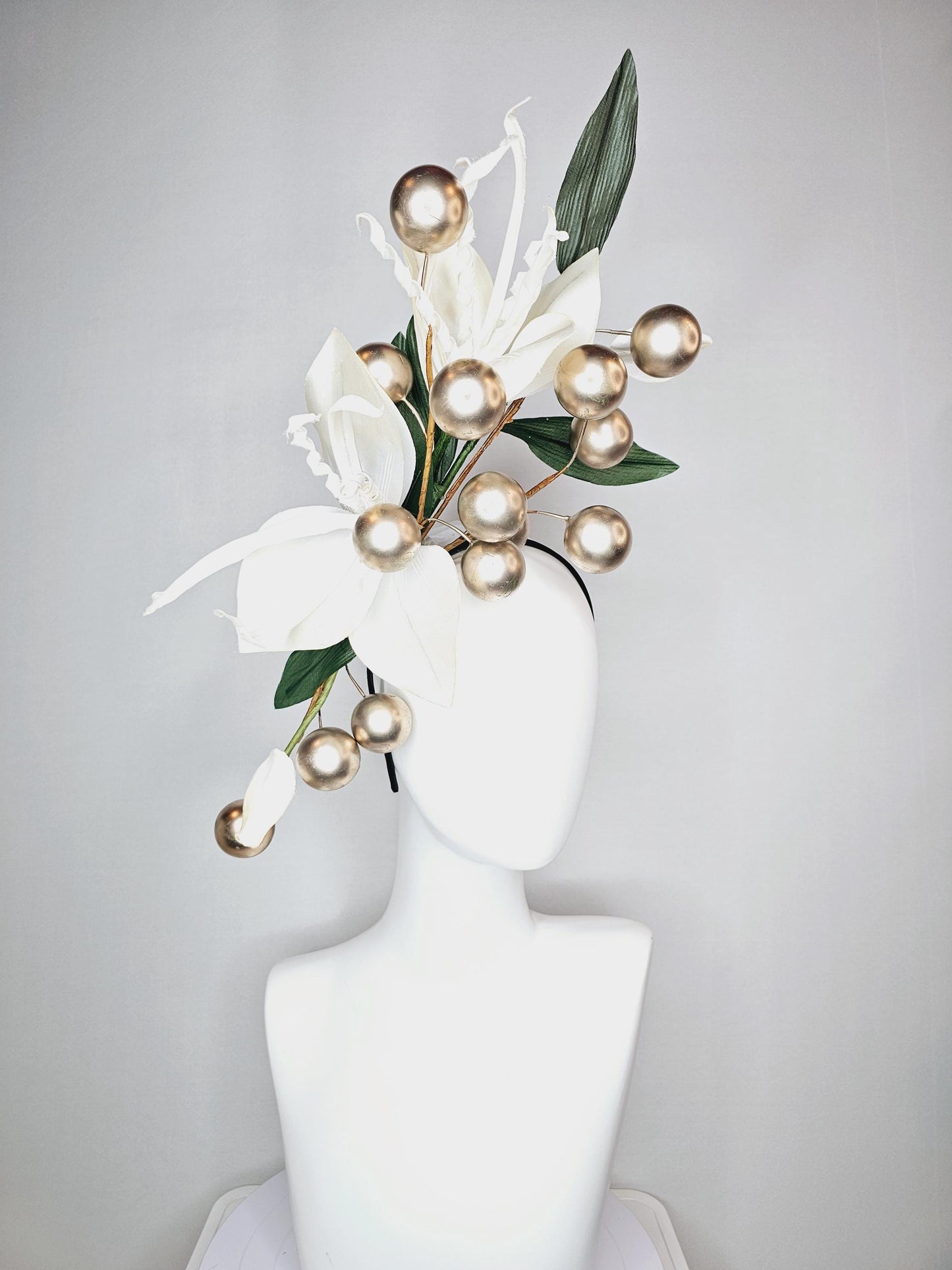 kentucky derby hat fascinator large ivory white satin silk flowers with large dark green leaves and gold pearls