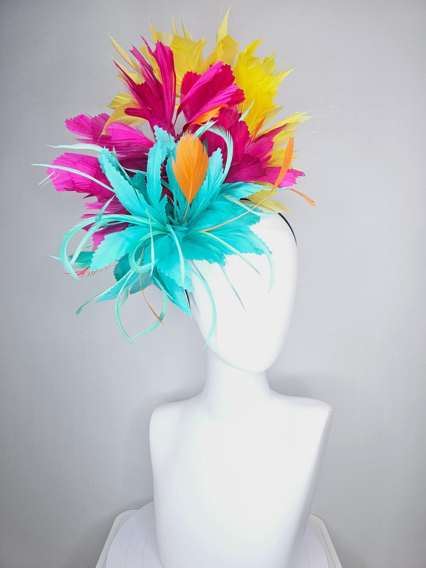 kentucky derby hat fascinator colorful fluffy aqua blue zigzag feather flower and hot pink fuchsia cherry red yellow branching feathers