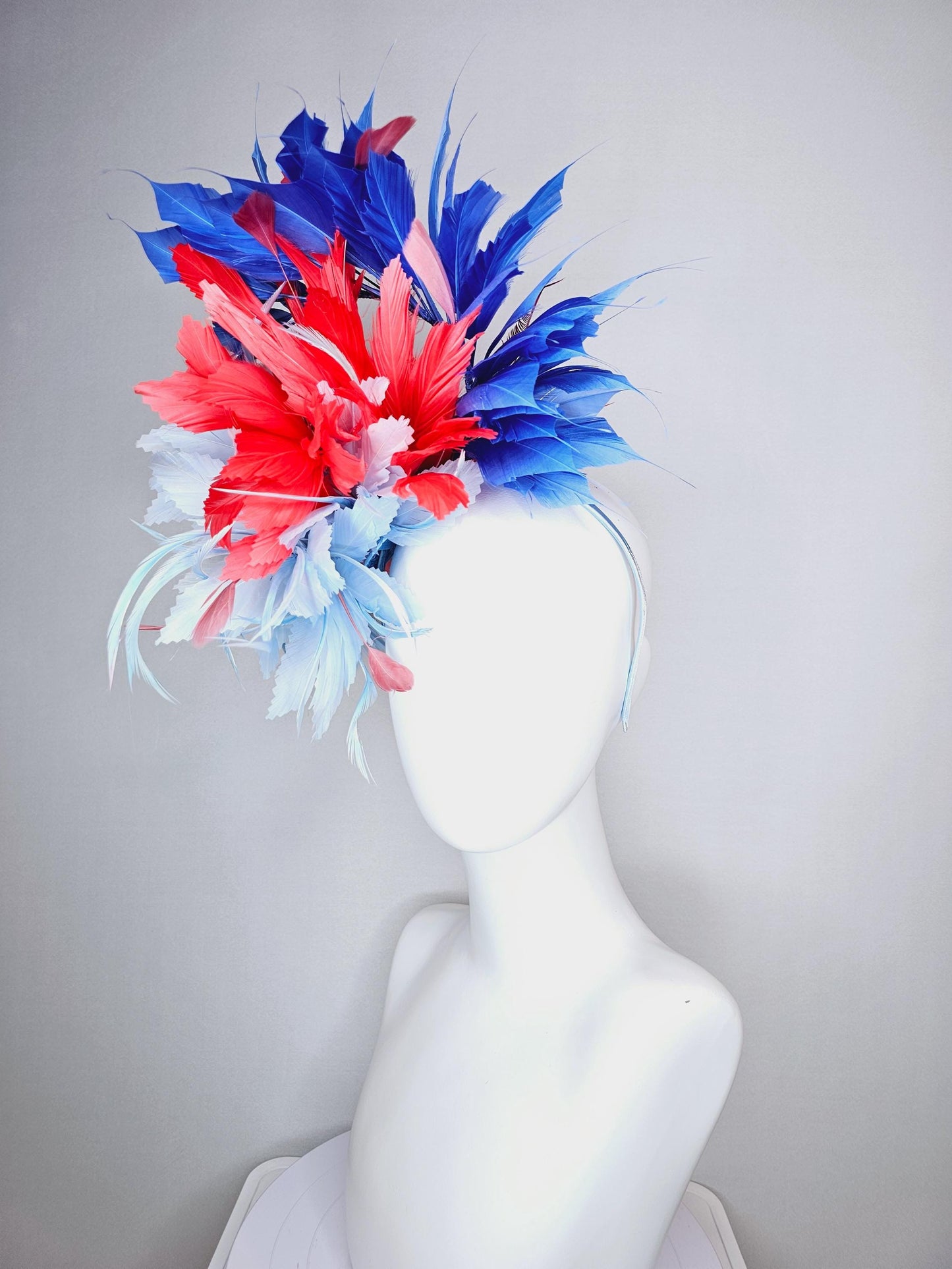 kentucky derby hat fascinator fluffy light blue zigzag feather flower and coral red royal cobalt blue baby blue branching feathers