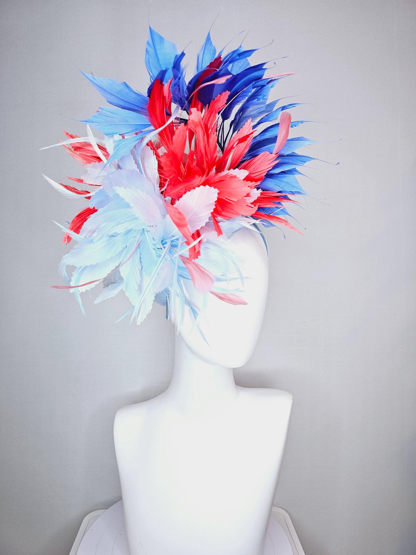 kentucky derby hat fascinator fluffy light blue zigzag feather flower and coral red royal cobalt blue baby blue branching feathers