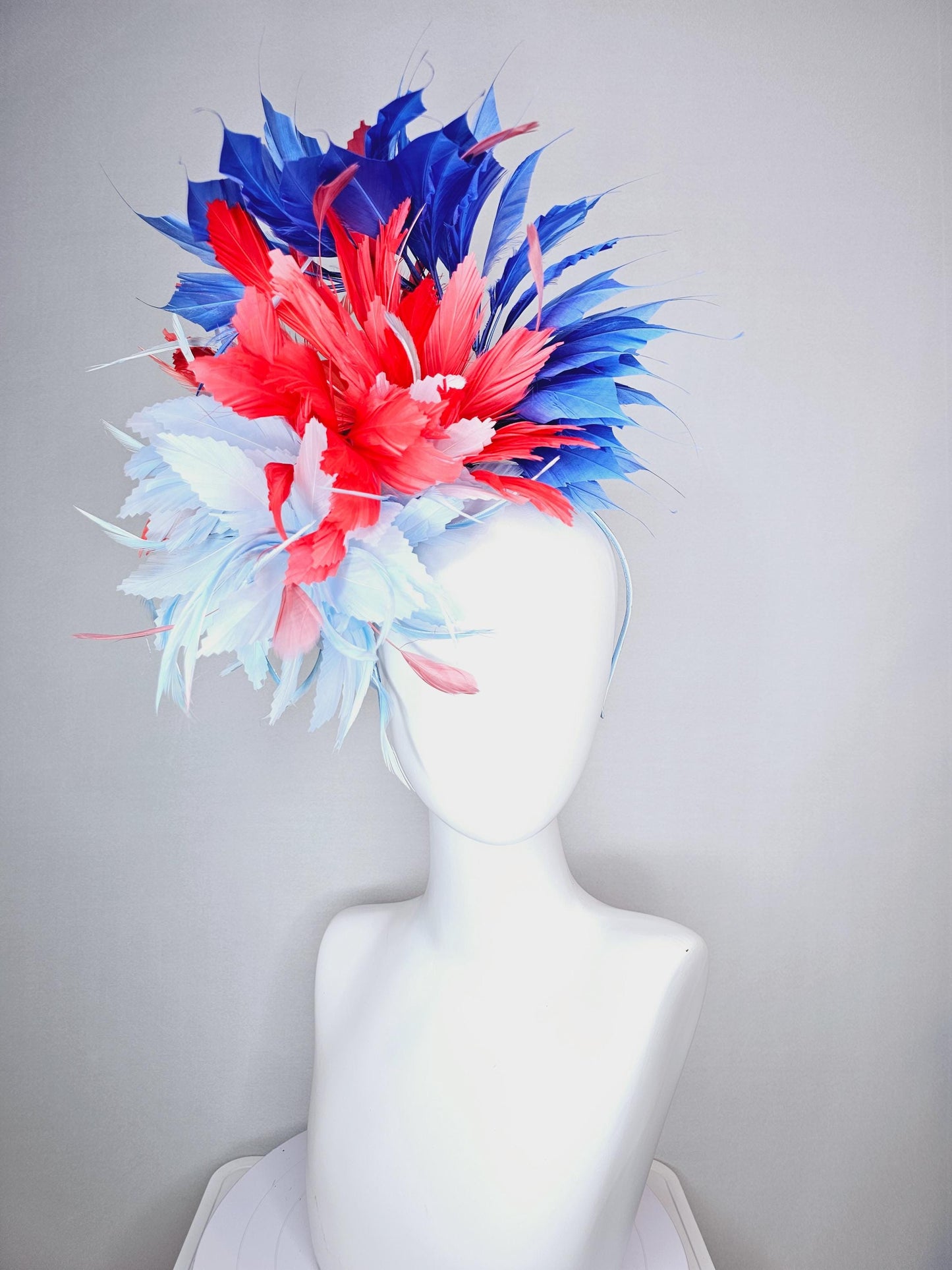 kentucky derby hat fascinator fluffy light blue zigzag feather flower and coral red royal cobalt blue baby blue branching feathers