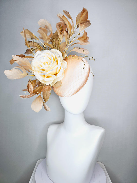 kentucky derby hat fascinator champagne pink satin with netting neutral cream satin rose flower gold leaves tan beige branching feathers