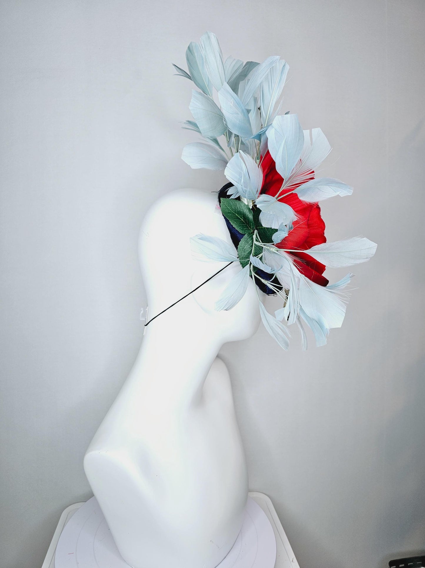 kentucky derby hat fascinator navy blue satin with netting red satin rose flower ombre green leaves with light teal blue branching feathers
