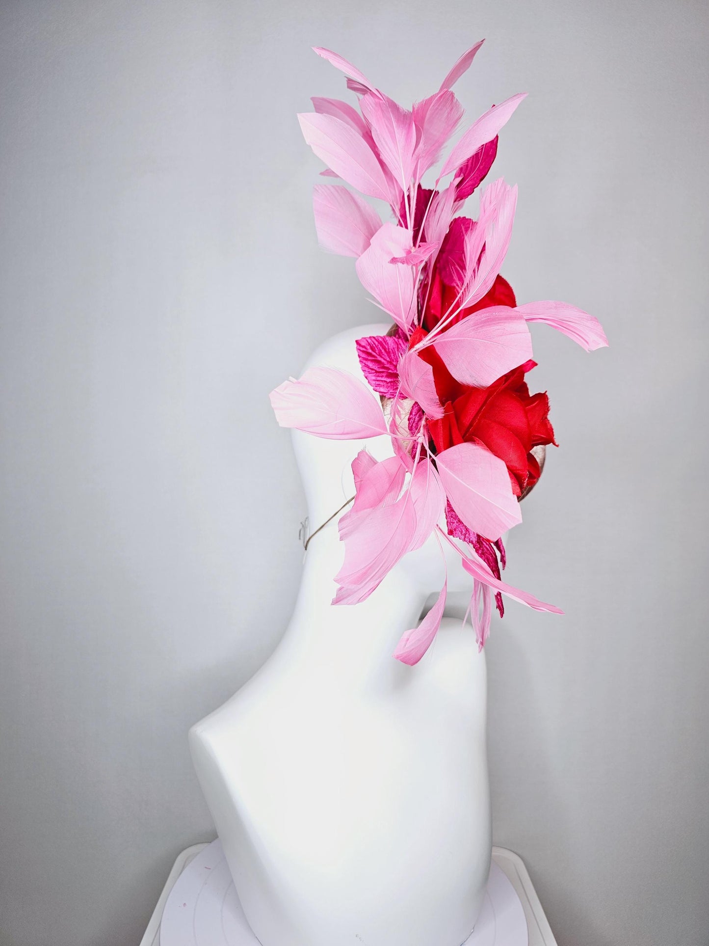 kentucky derby hat fascinator champagne pink satin with netting red satin rose flowers pink leaves and baby blush pink branching feathers