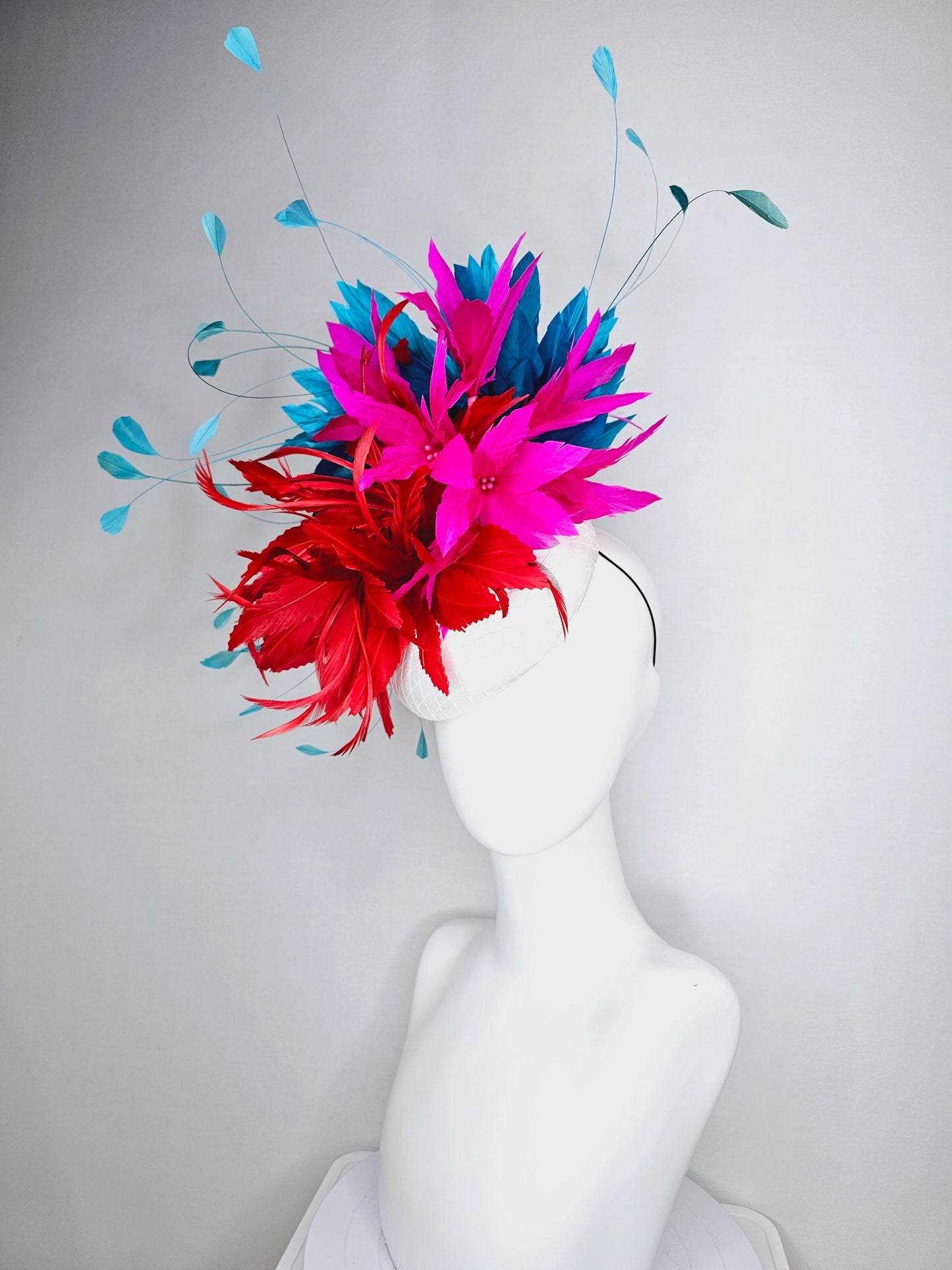 kentucky derby hat fascinator colorful white satin with netting scarlet red and bright fuchsia pink feather flowers and teal blue feathers