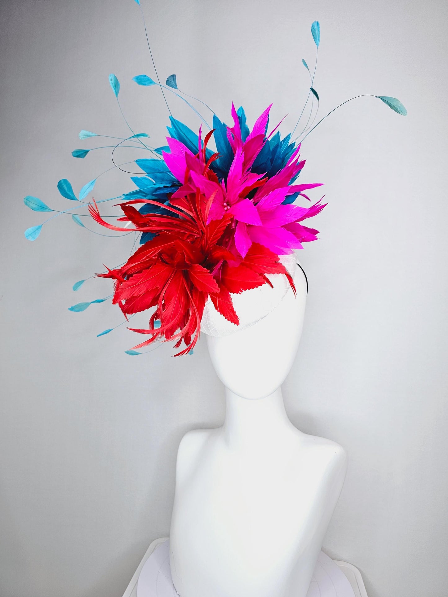 kentucky derby hat fascinator colorful white satin with netting scarlet red and bright fuchsia pink feather flowers and teal blue feathers