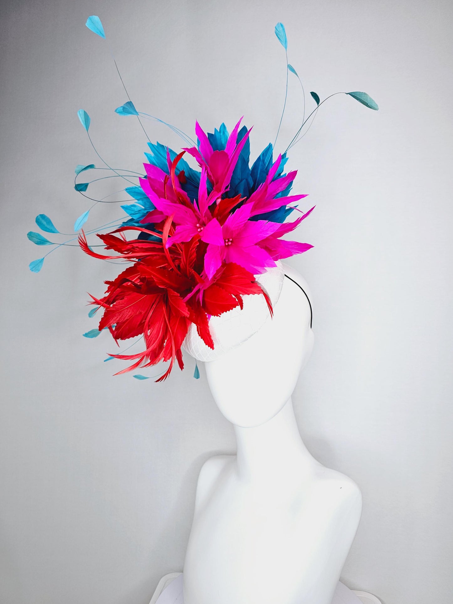 kentucky derby hat fascinator colorful white satin with netting scarlet red and bright fuchsia pink feather flowers and teal blue feathers