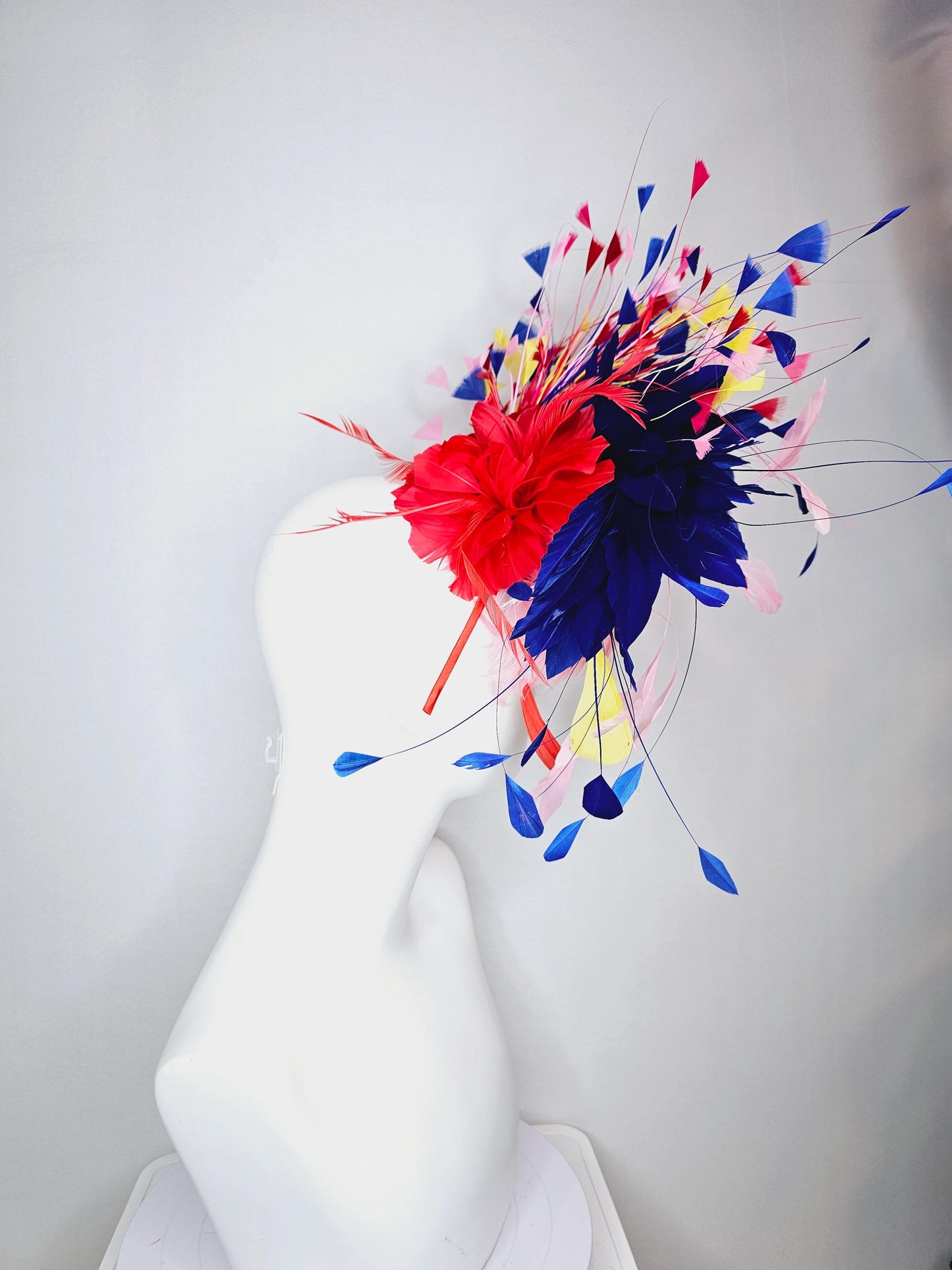 kentucky derby hat fascinator light pink and red feather flowers with colorful light pink yellow royal cobalt blue red branching feathers