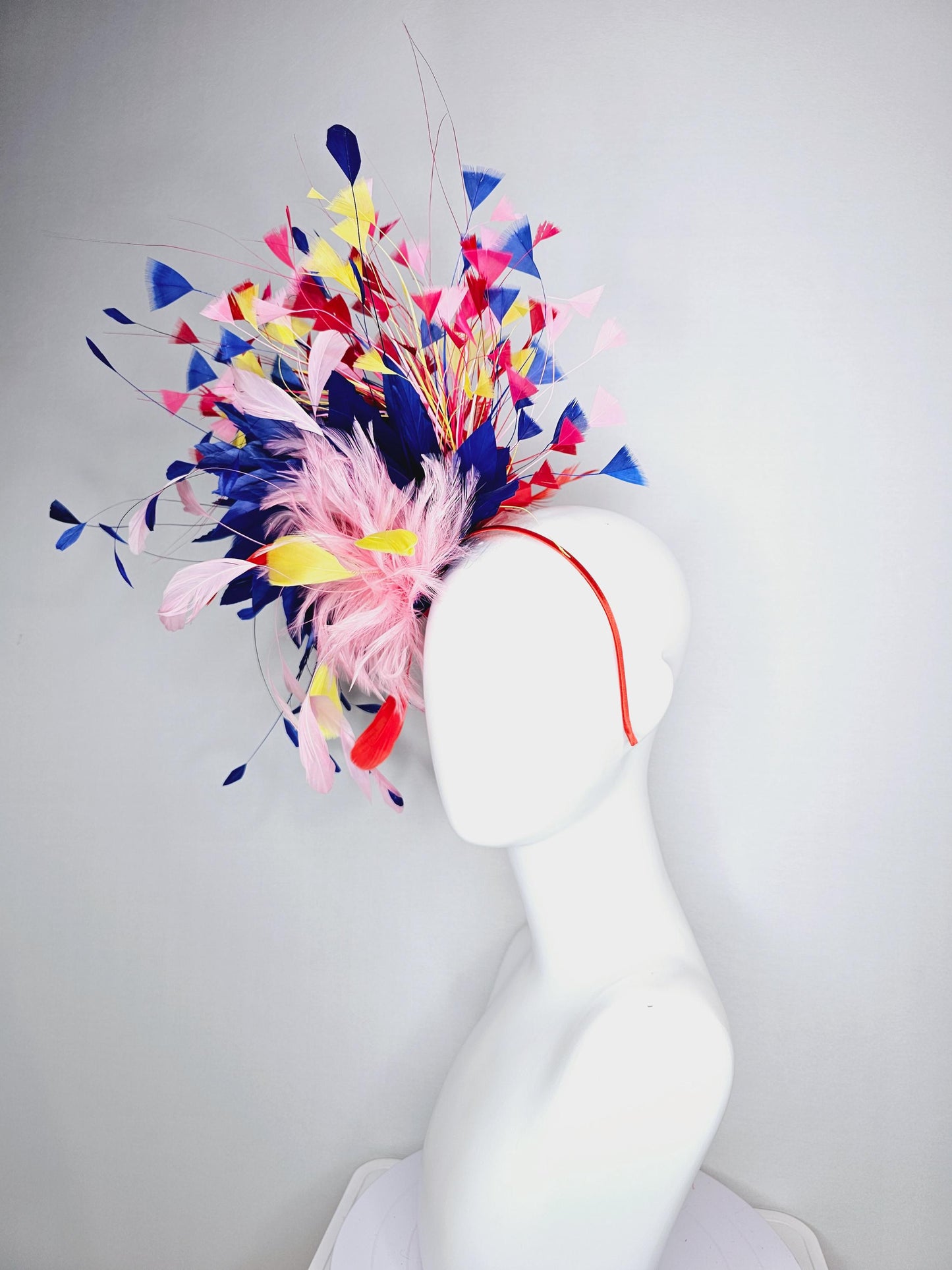 kentucky derby hat fascinator light pink and red feather flowers with colorful light pink yellow royal cobalt blue red branching feathers