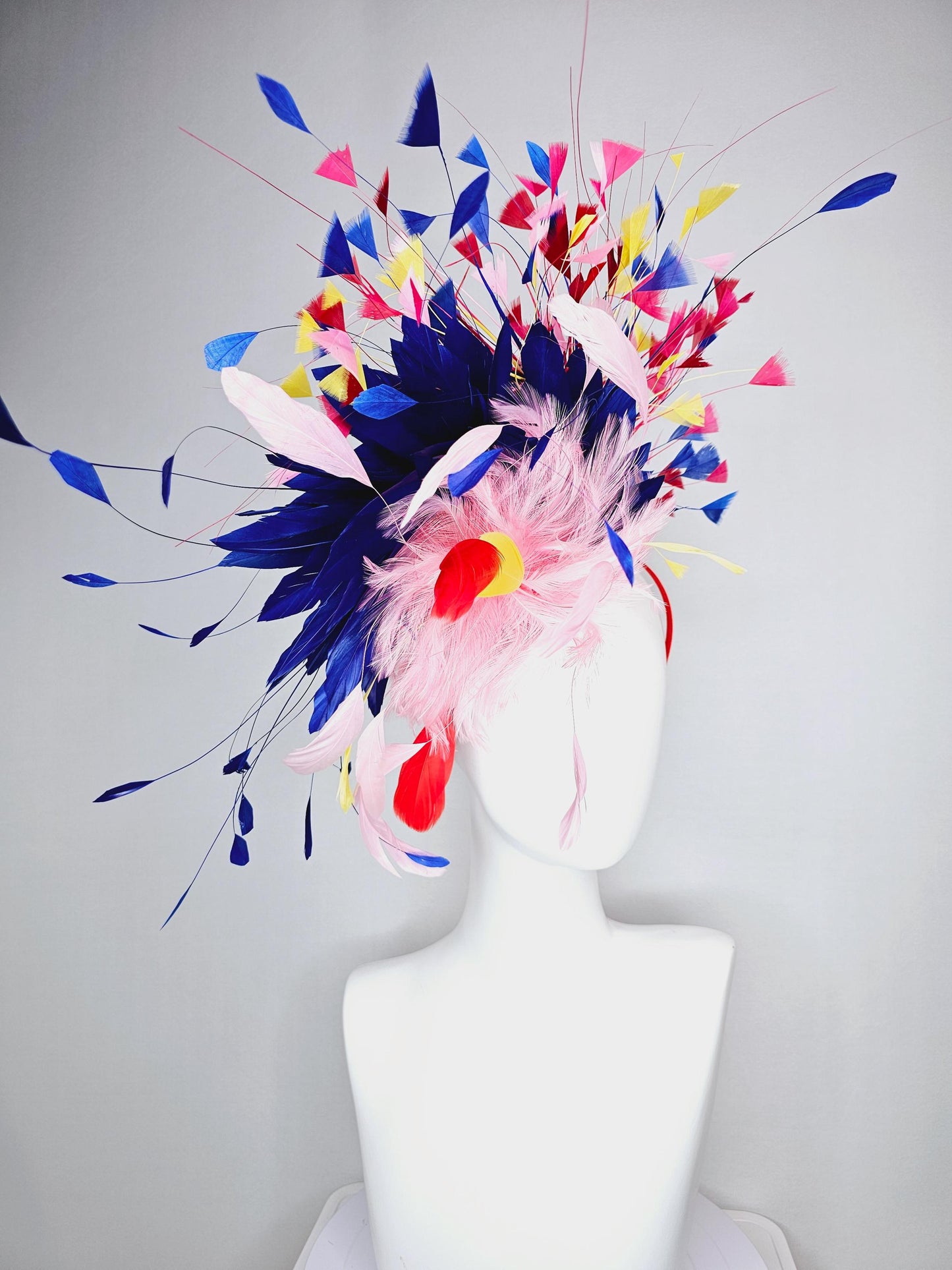 kentucky derby hat fascinator light pink and red feather flowers with colorful light pink yellow royal cobalt blue red branching feathers