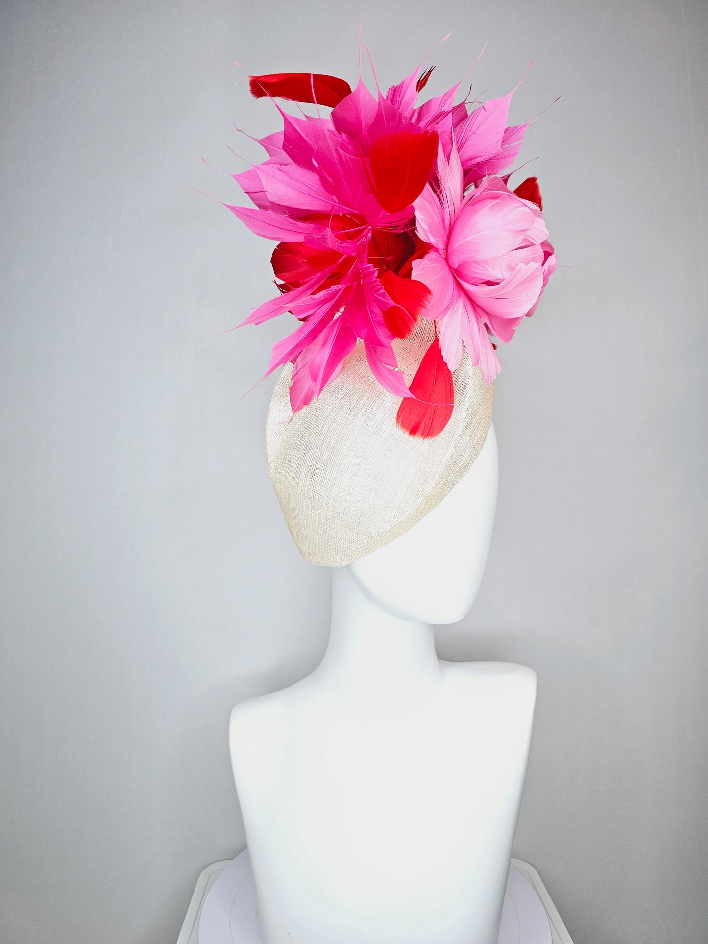 kentucky derby hat fascinator neutral beige  pointed teardrop perch sinamay with fluffy blush pink feather flower and pink red feathers