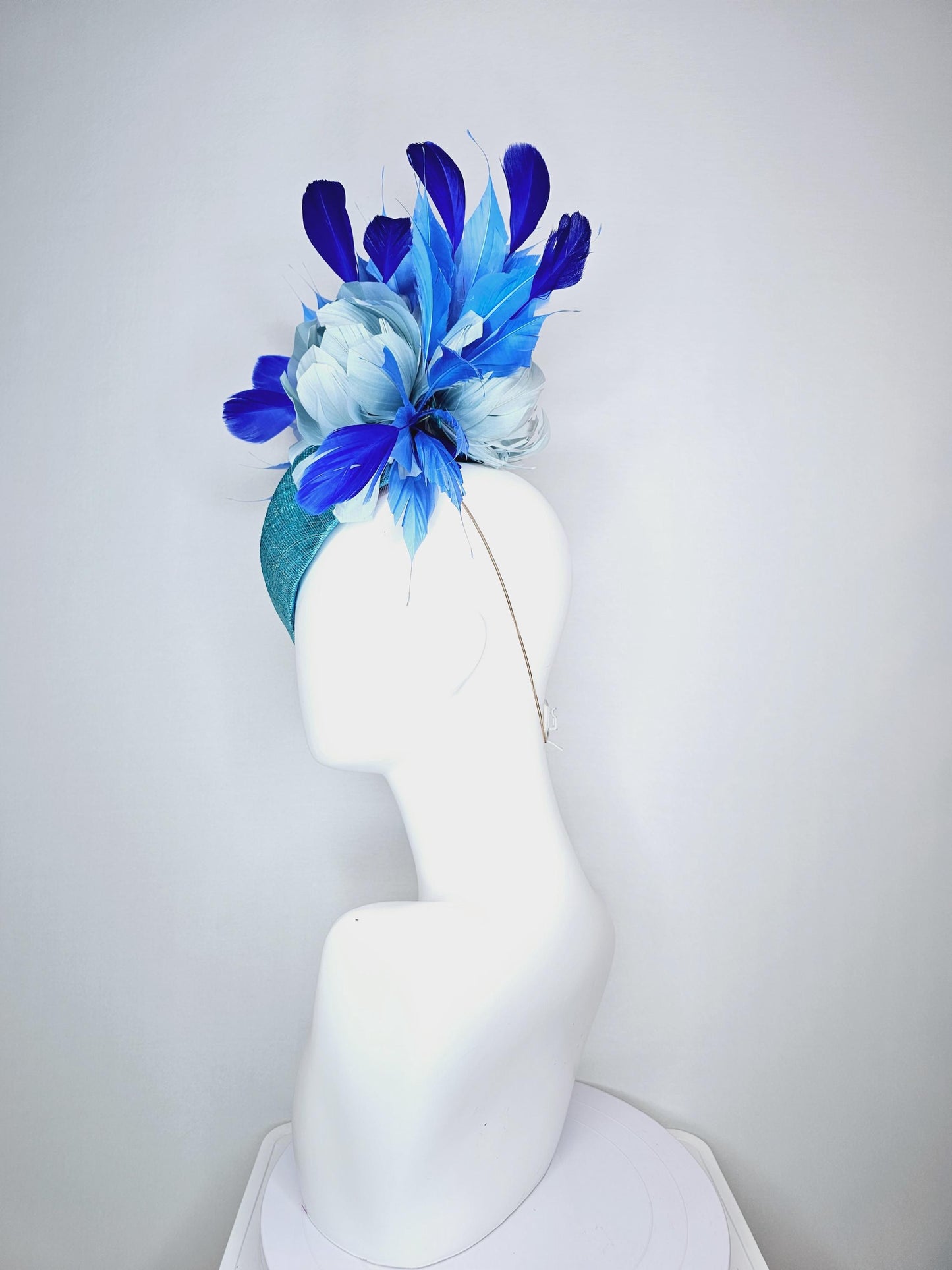 kentucky derby hat fascinator turquoise blue pointed teardrop perch sinamay with fluffy baby blue feather flower royal cobalt blue feathers