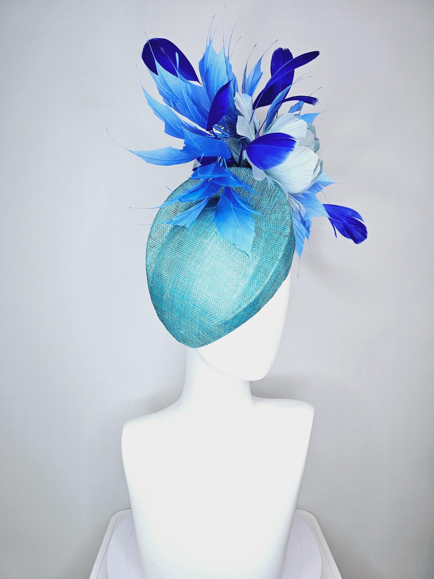 kentucky derby hat fascinator turquoise blue pointed teardrop perch sinamay with fluffy baby blue feather flower royal cobalt blue feathers