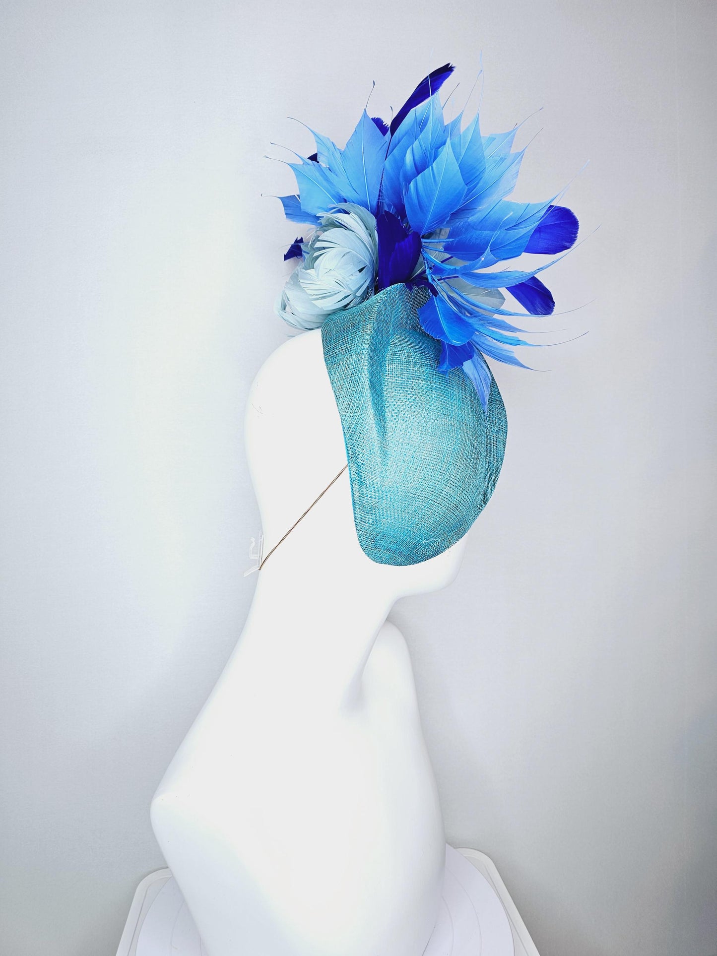 kentucky derby hat fascinator turquoise blue pointed teardrop perch sinamay with fluffy baby blue feather flower royal cobalt blue feathers