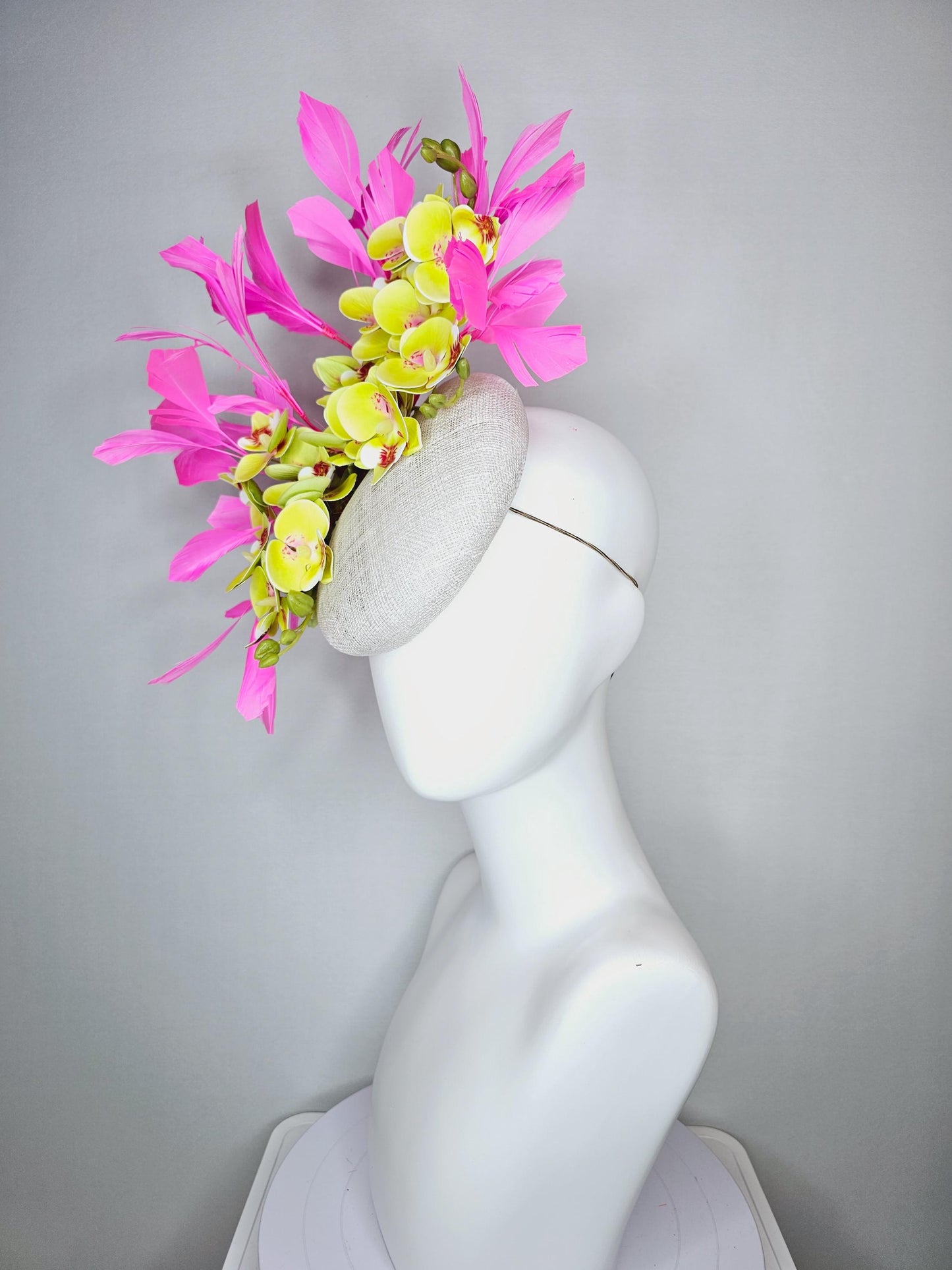 kentucky derby hat fascinator neutral white sinamay with yellow and dark red satin orchid flowers with bubble gum pink branching feathers
