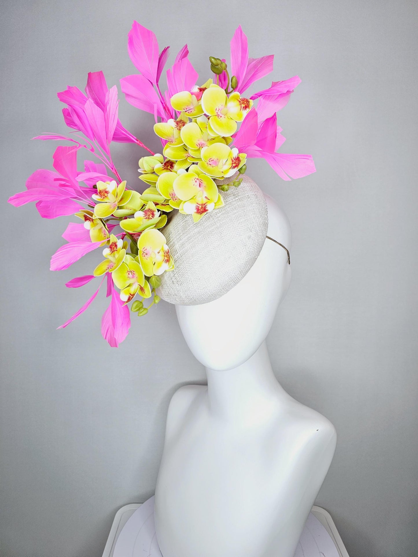 kentucky derby hat fascinator neutral white sinamay with yellow and dark red satin orchid flowers with bubble gum pink branching feathers