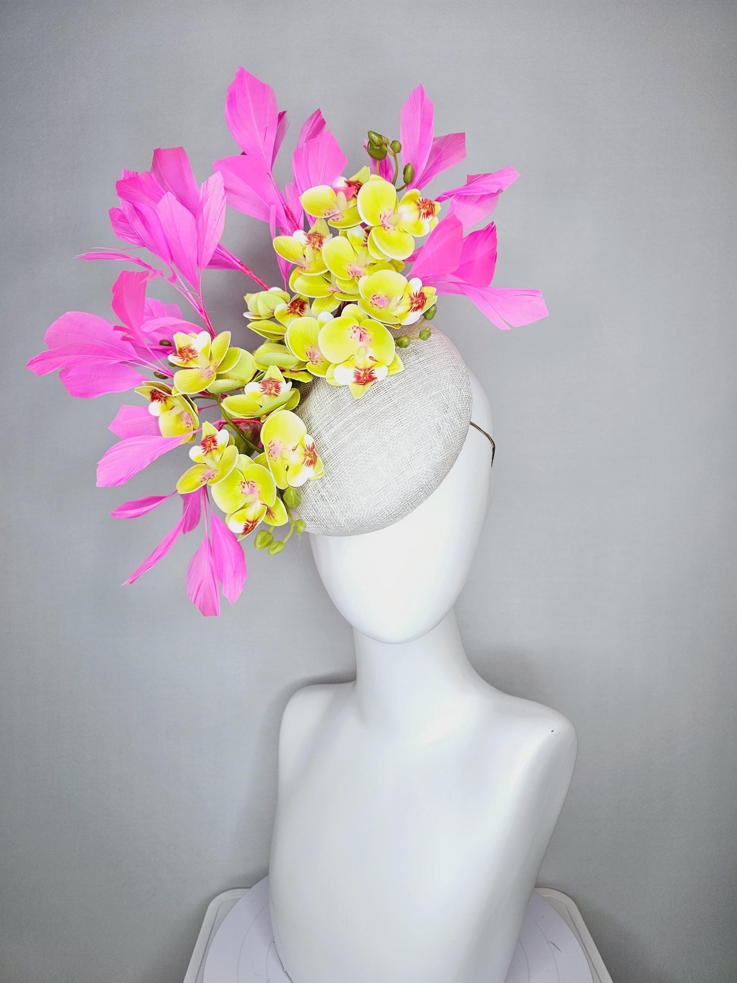kentucky derby hat fascinator neutral white sinamay with yellow and dark red satin orchid flowers with bubble gum pink branching feathers