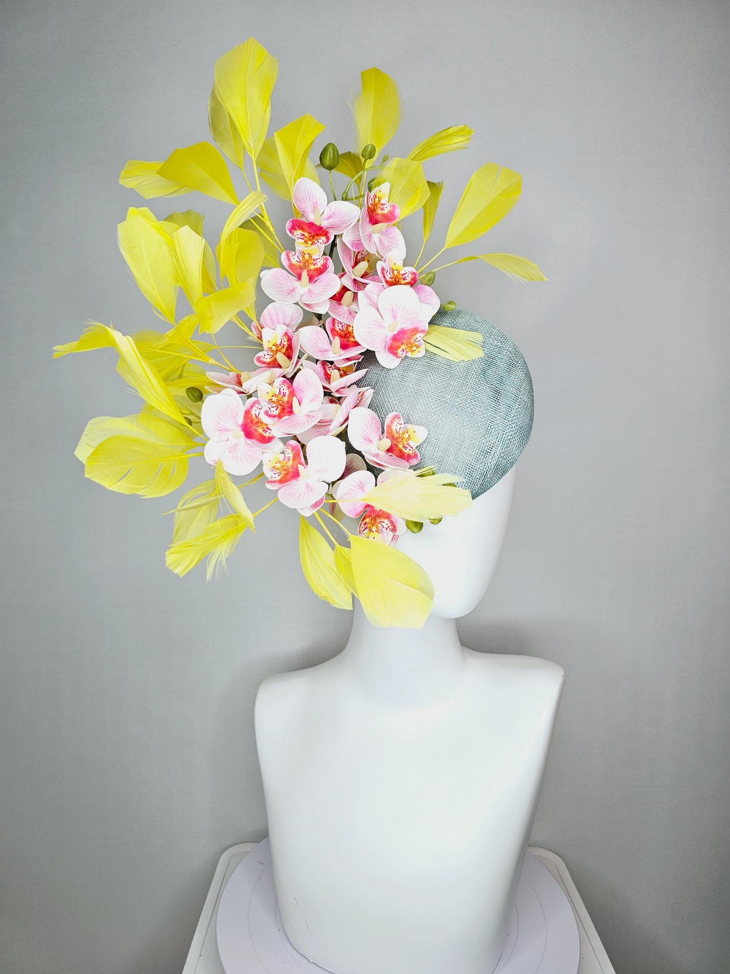 kentucky derby hat fascinator light blue sinamay with white blush pink satin orchid flowers with yellow branching feathers