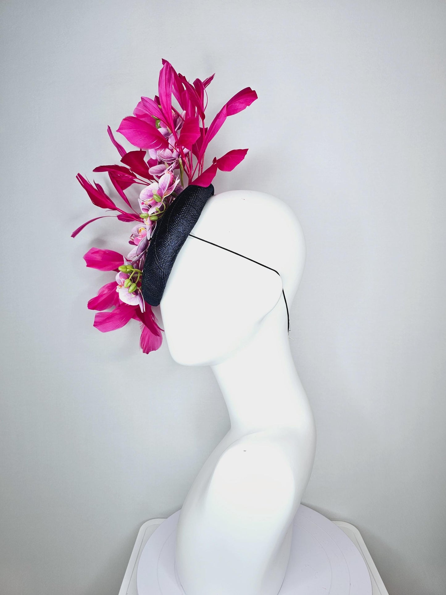 kentucky derby hat fascinator navy blue sinamay with white and blush pink satin orchid flowers and hot pink branching feathers