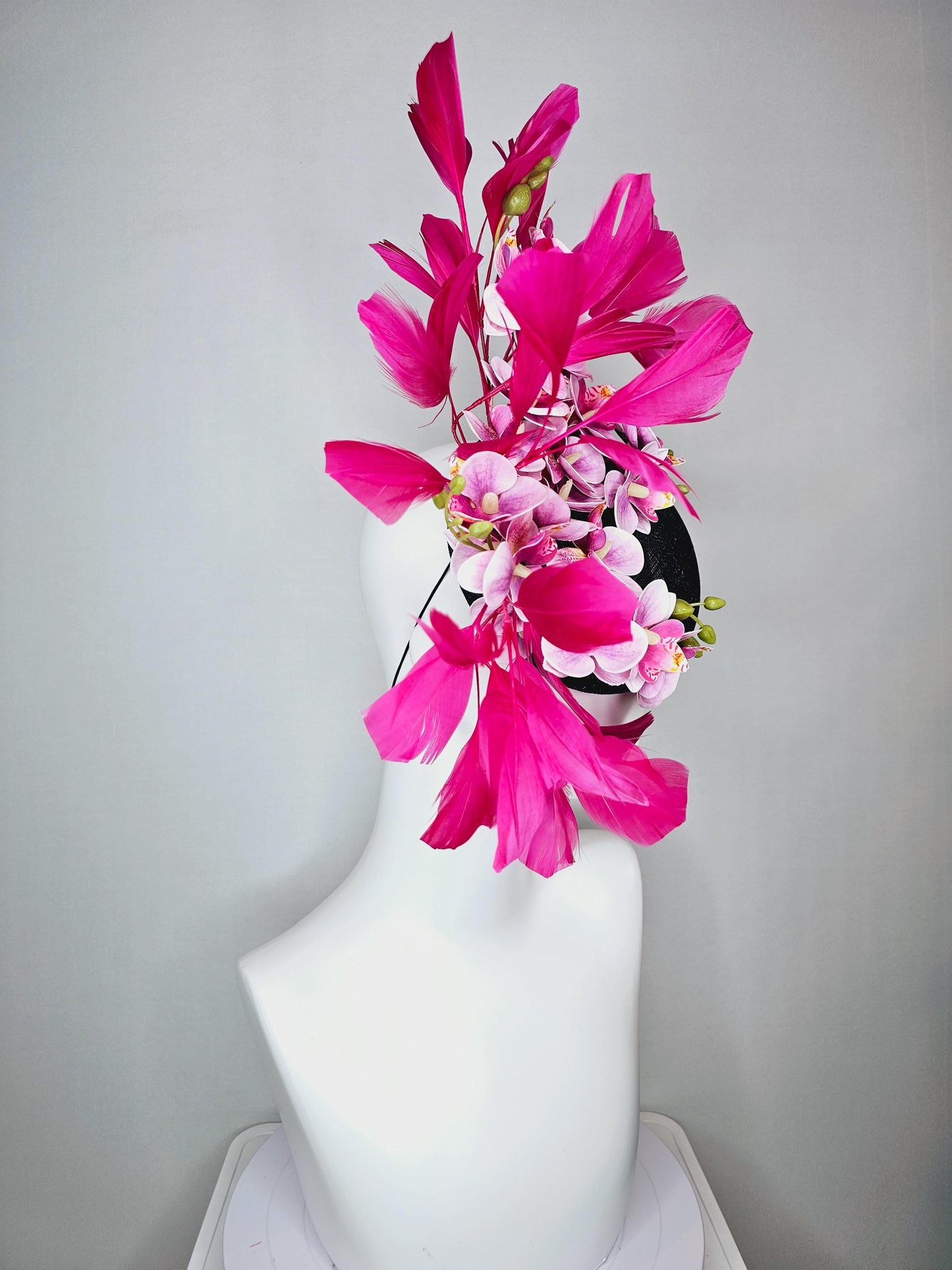 kentucky derby hat fascinator navy blue sinamay with white and blush pink satin orchid flowers and hot pink branching feathers